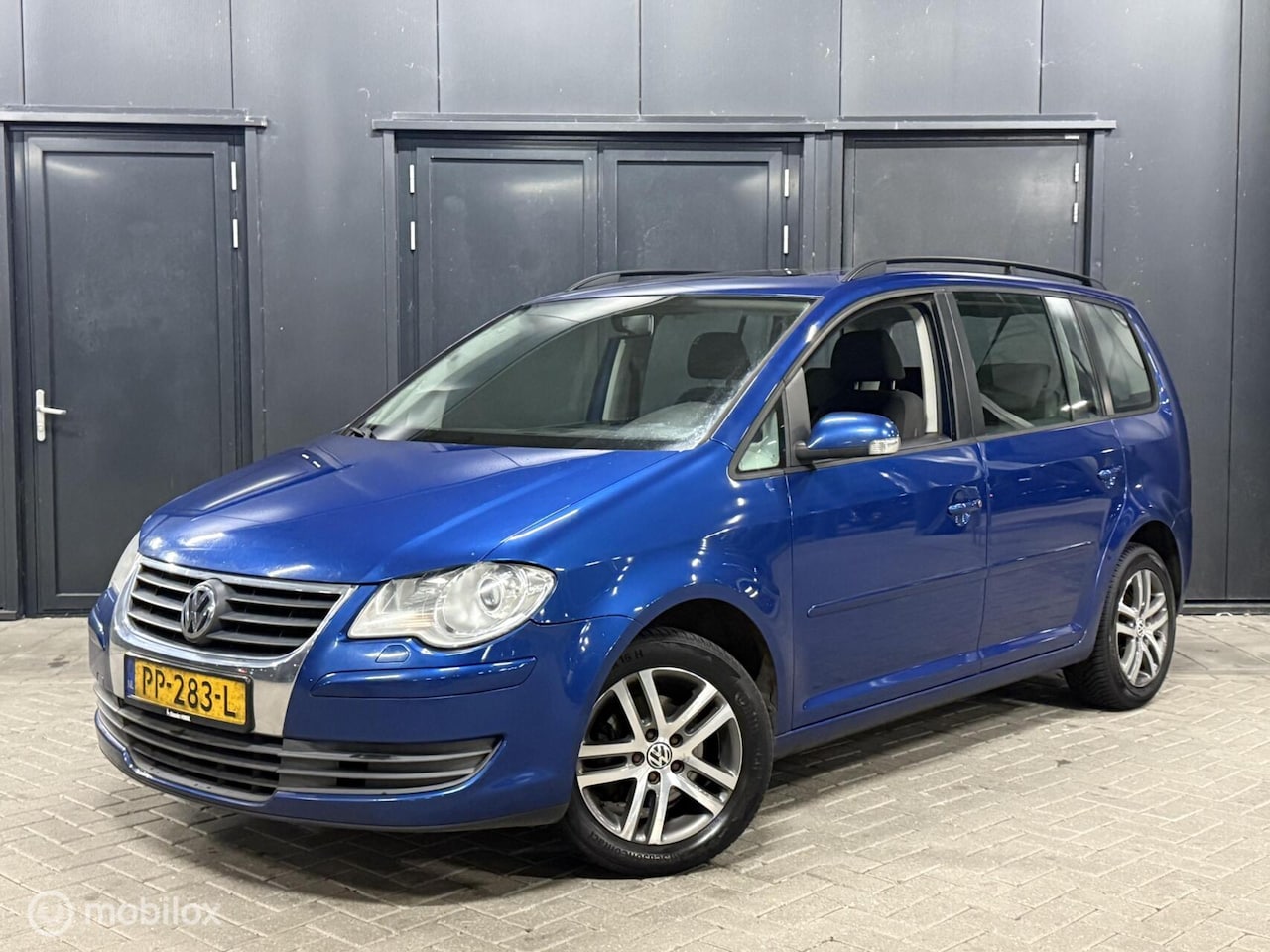 Volkswagen Touran - 1.4 TSI Optive 7 pers|schuifdak|carplay - AutoWereld.nl