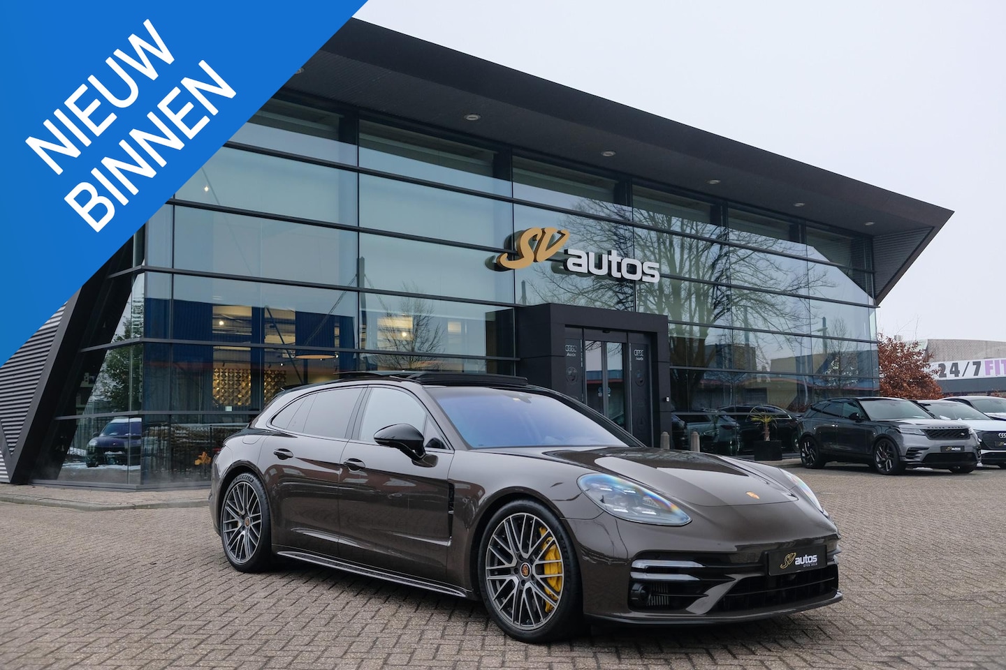 Porsche Panamera Sport Turismo - 4.0 V8 Turbo S 700pk E-Hybrid Panoramadak Keramisch Luchtvering 4-wielsturing NLauto 1e ei - AutoWereld.nl