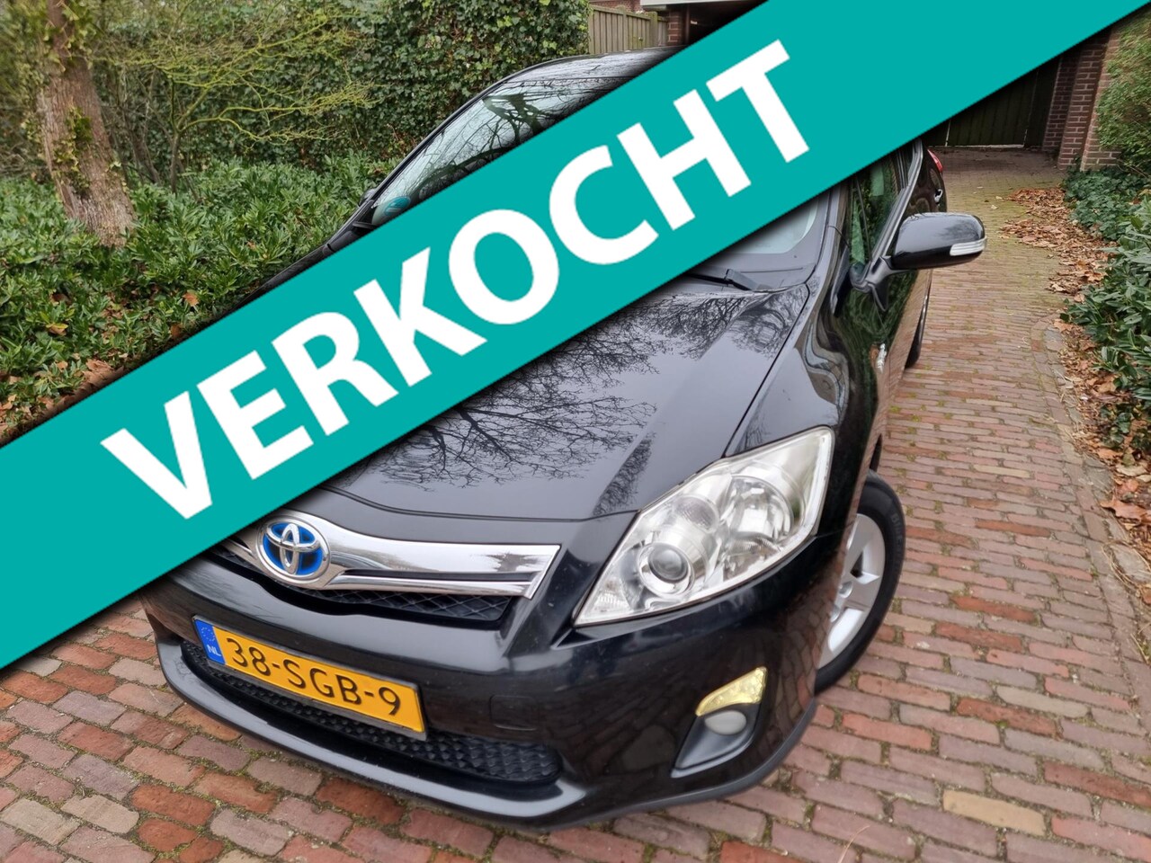 Toyota Auris - 1.8 Full Hybrid Aspiration Navigator - AutoWereld.nl