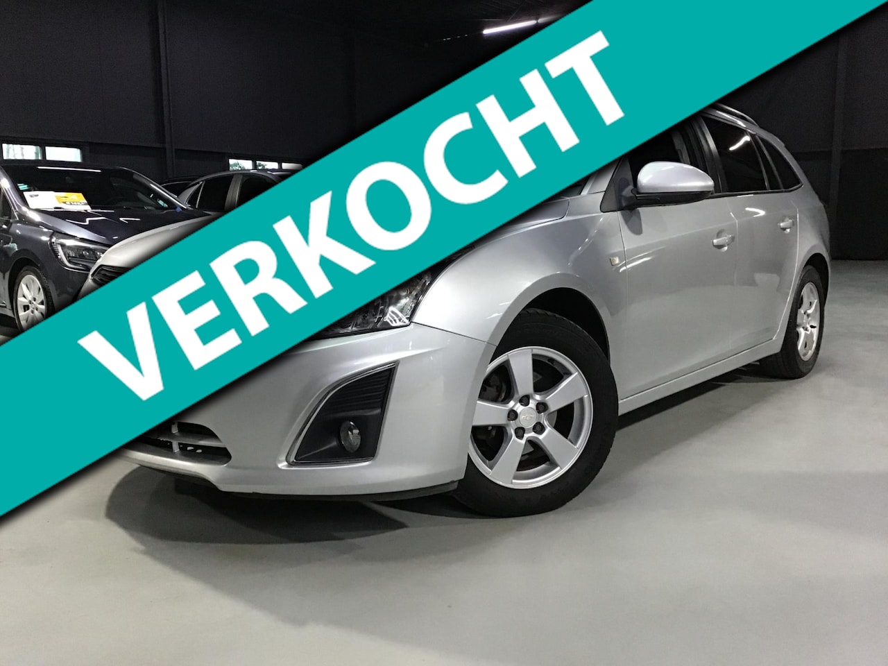 Chevrolet Cruze Station Wagon - 1.4T LTZ I 91xxx KM I Trekhaak I Navi I Clima I Cruise I Camera I Park.sens I New Kln Brt - AutoWereld.nl