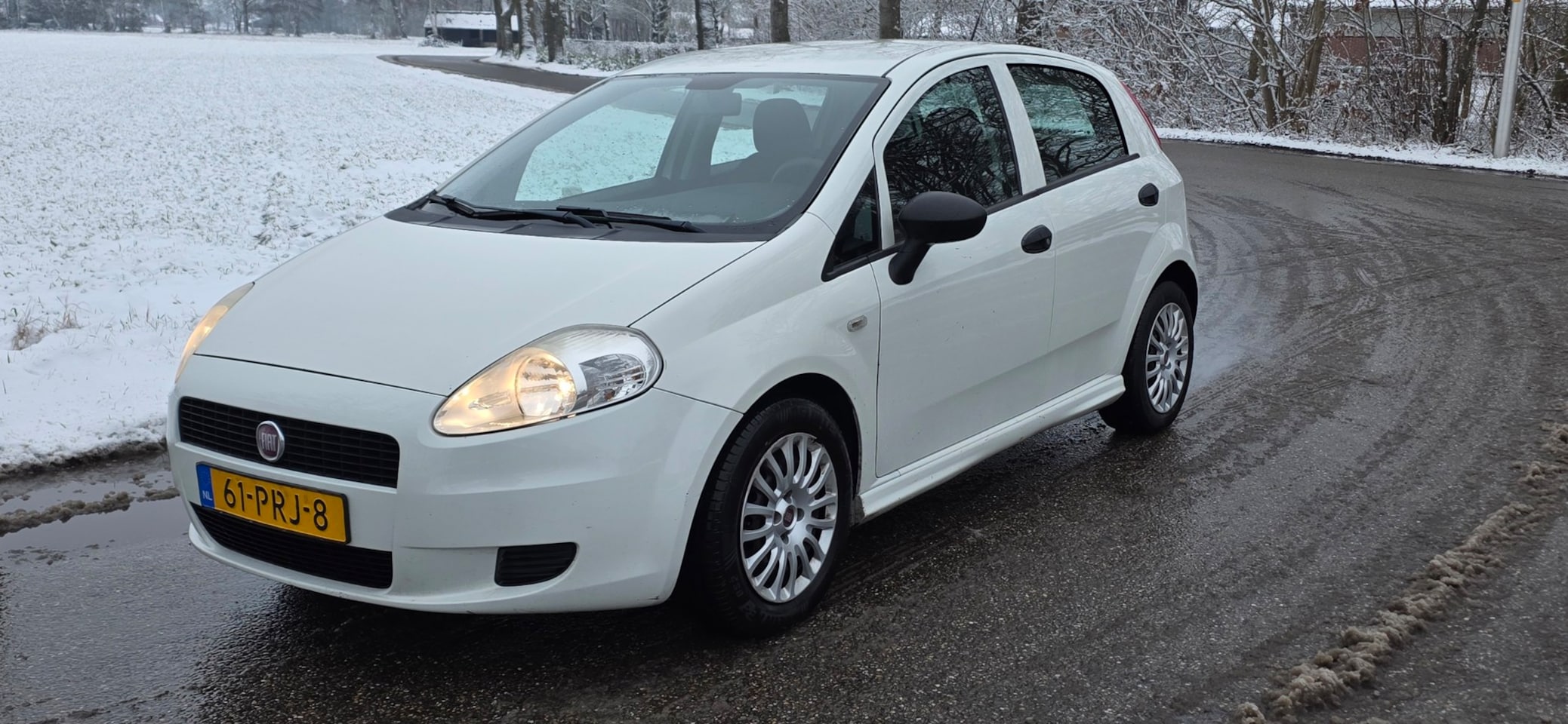 Fiat Grande Punto - 1.3 M-Jet Actual | 5drs | airco | lange apk keuring | rijd top ! - AutoWereld.nl