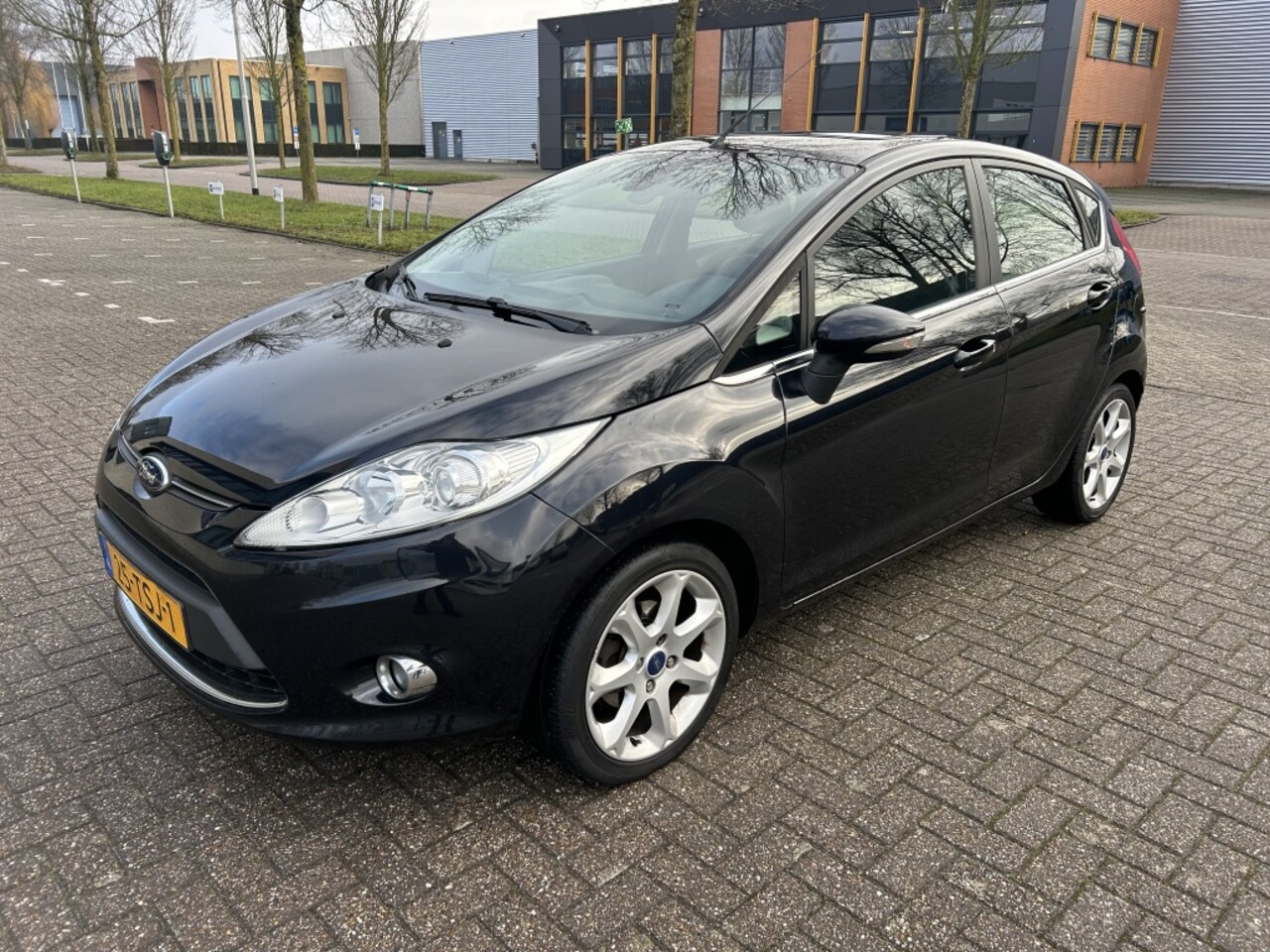 Ford Fiesta - 1.25 Titanium SCHUIFDAK CLIMA CRUISE NAP! - AutoWereld.nl