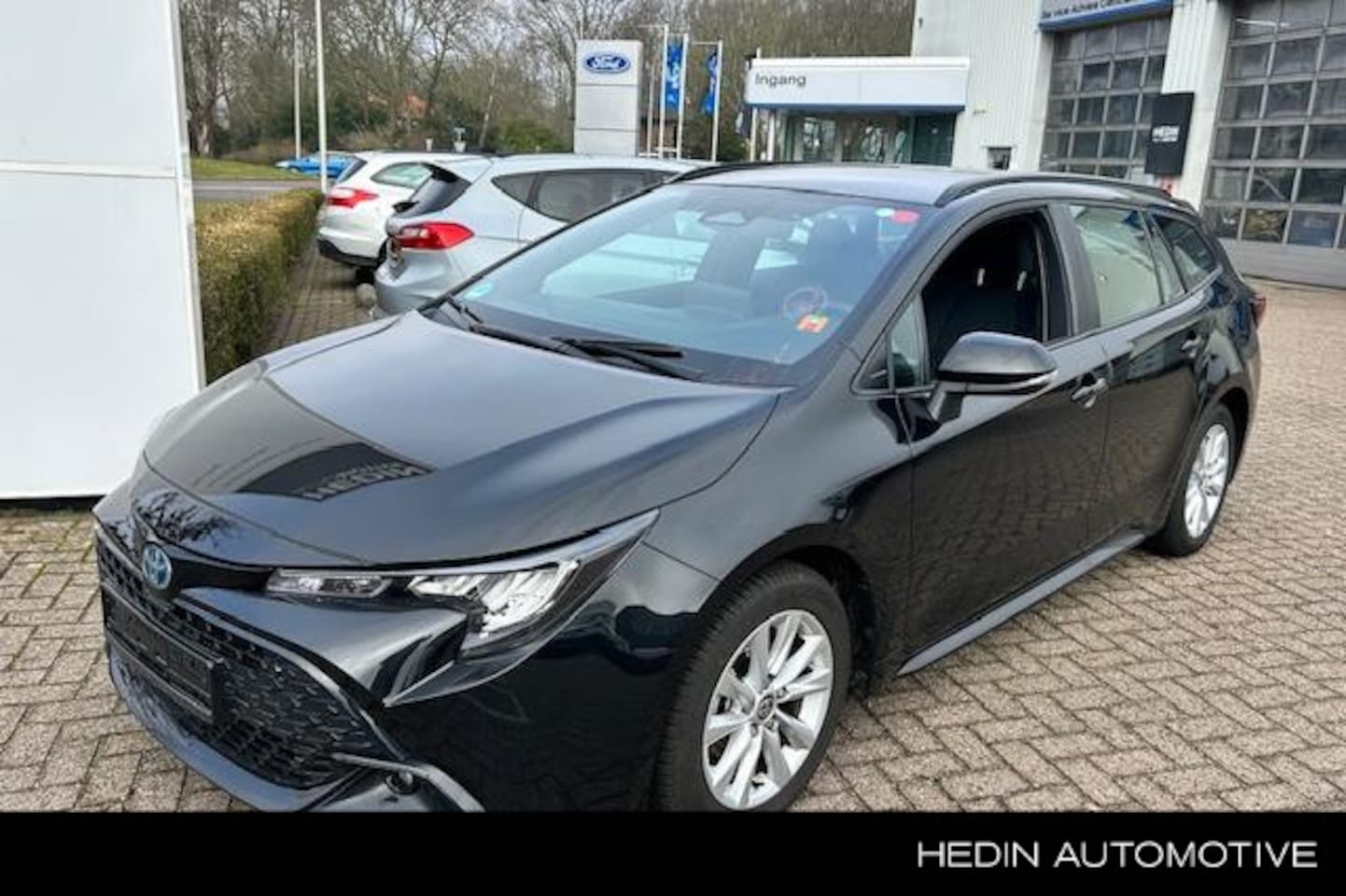 Toyota Corolla Touring Sports - Hybrid 140 Business - AutoWereld.nl
