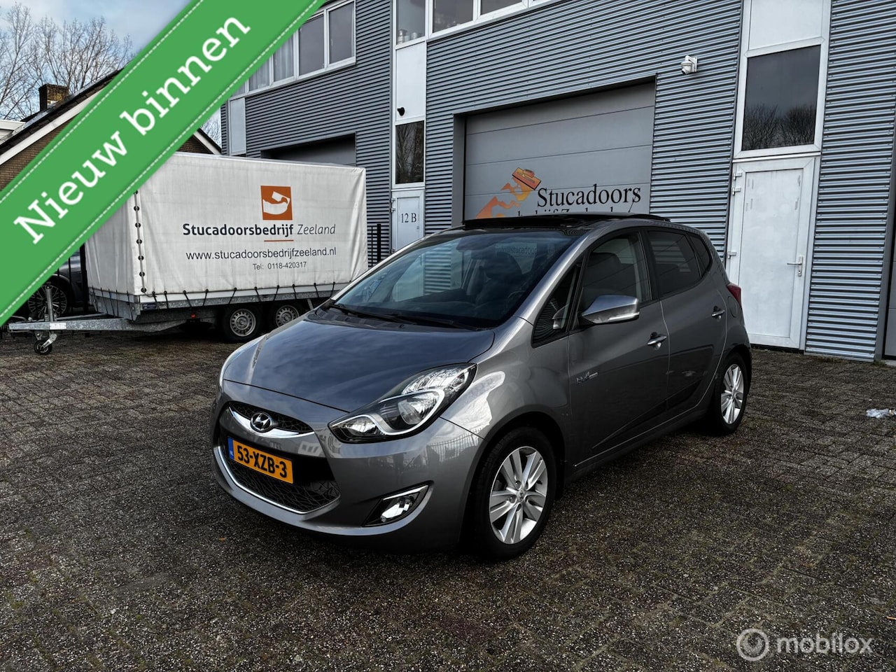 Hyundai ix20 - 1.6i i-Motion Panorama Dak Clima Cruise - AutoWereld.nl