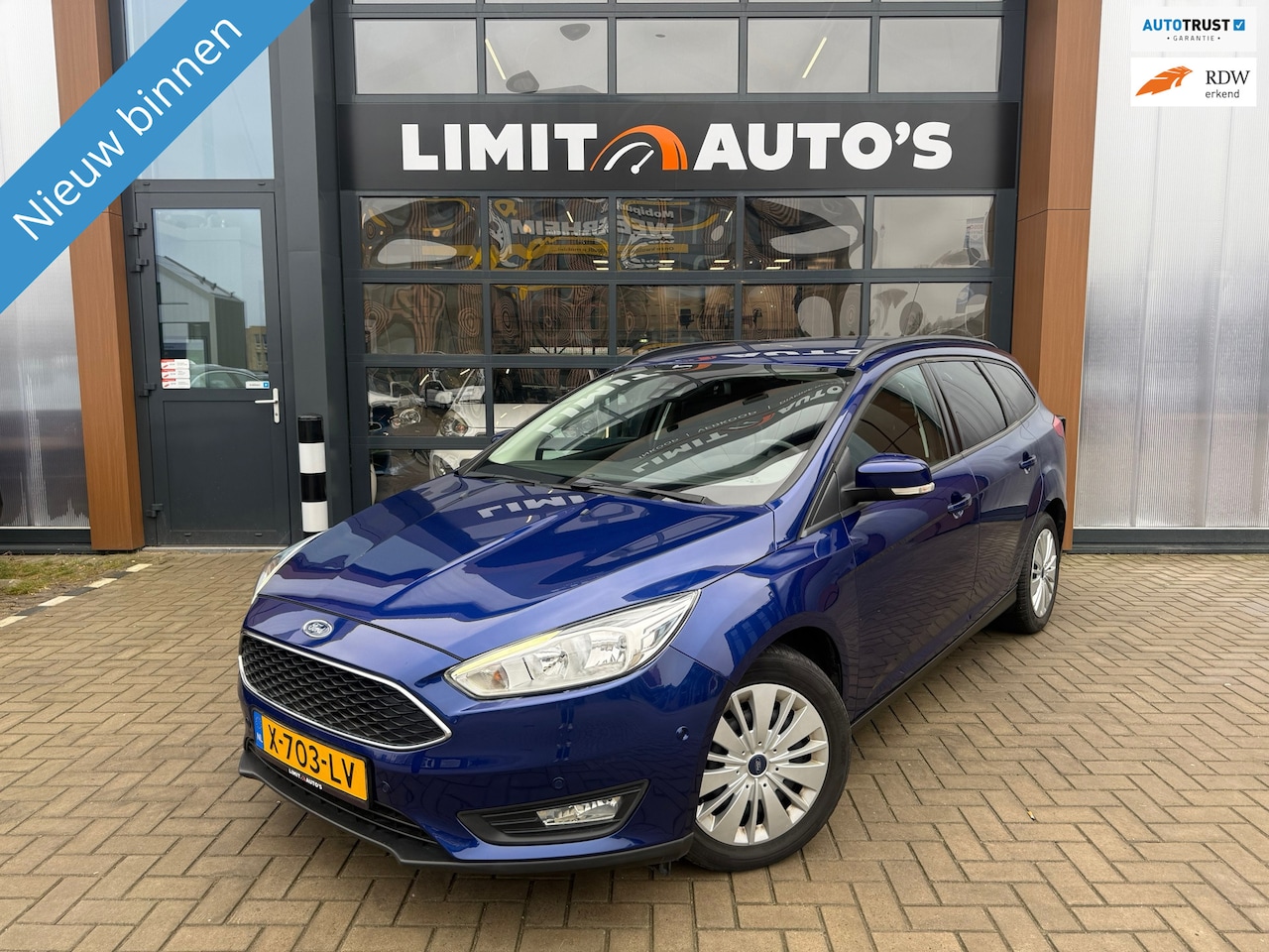 Ford Focus Wagon - 1.0 Trend Aut/Climate/Navi/Pdc.v+a/Cruise/Apk - AutoWereld.nl