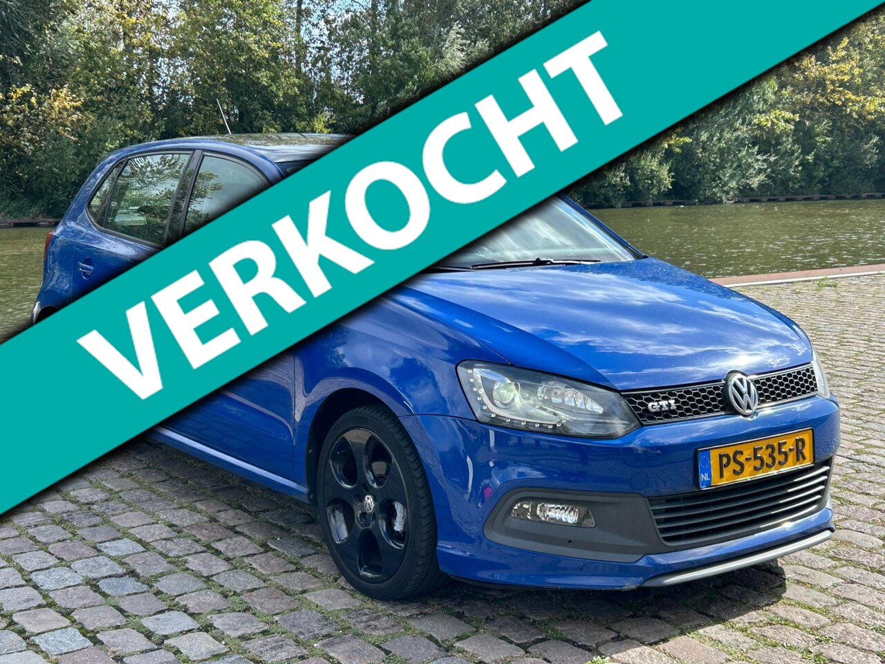 Volkswagen Polo - 1.2 Easyline Lage km navigatie airco cruis control cv op afs - AutoWereld.nl