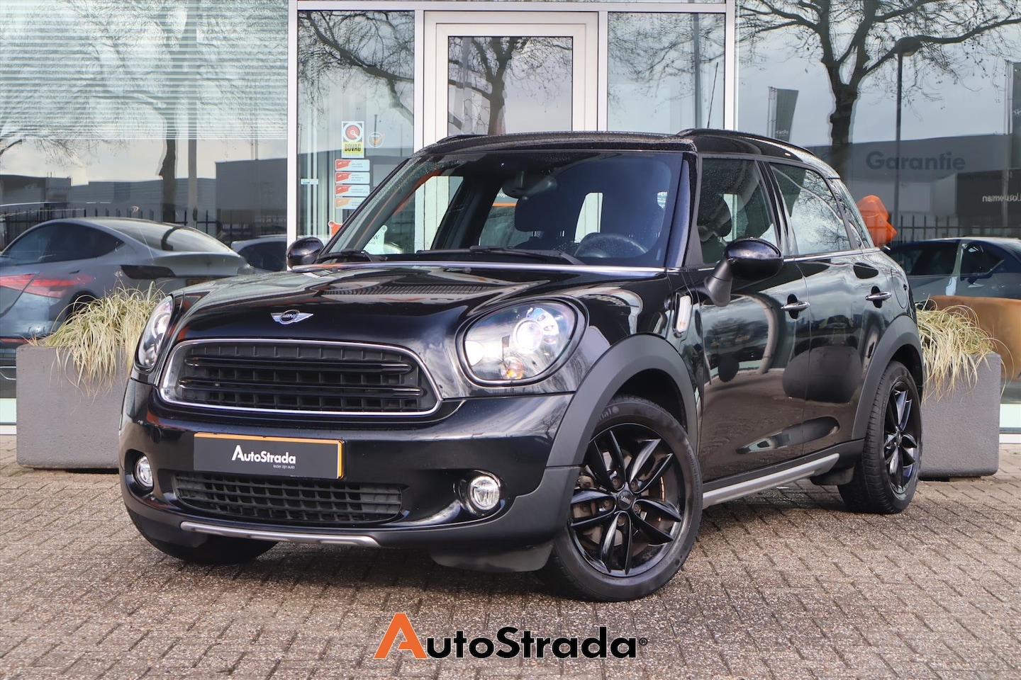 MINI Countryman - 1.6 CLASSIC BRITISH EDITION | Xenon | Navi | Bluetooth | Cruise | Climate | Sensoren - AutoWereld.nl