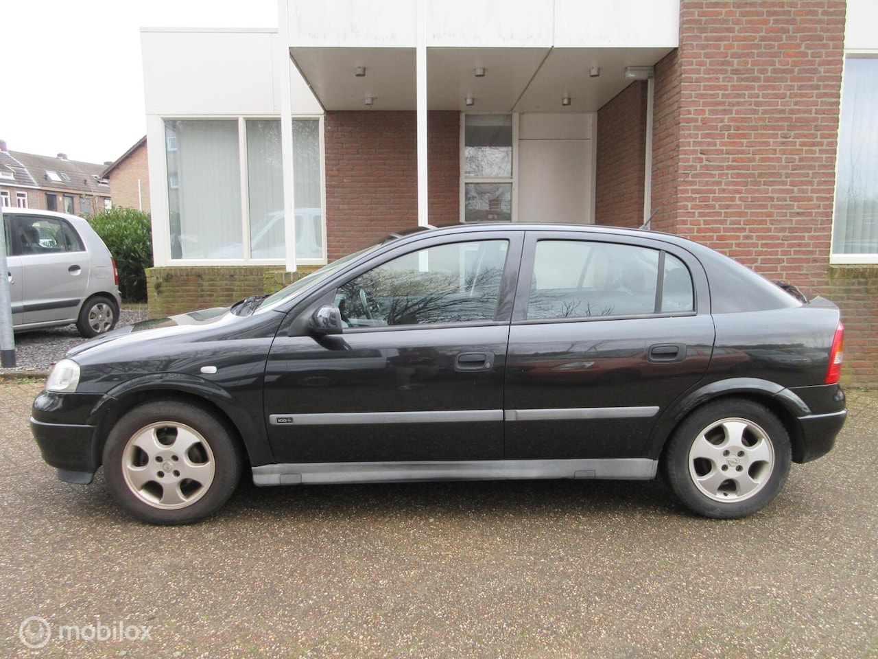 Opel Astra - 1.6-16V Centennial / Airco - AutoWereld.nl