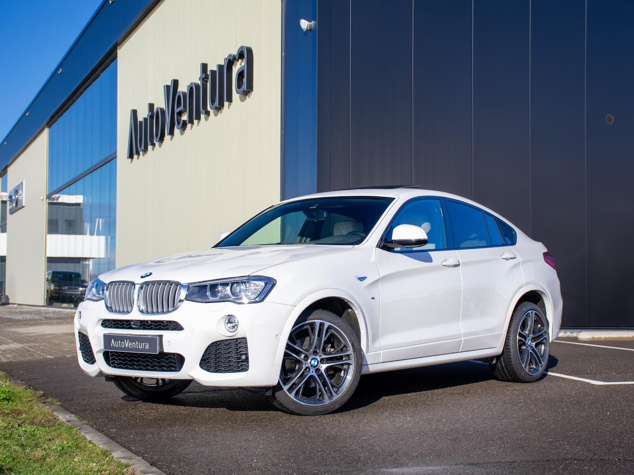 BMW X4 - xDrive35i High Executive M Sport Edition | M-Sport | Schuif kanteldak | Stoelverwarming | - AutoWereld.nl