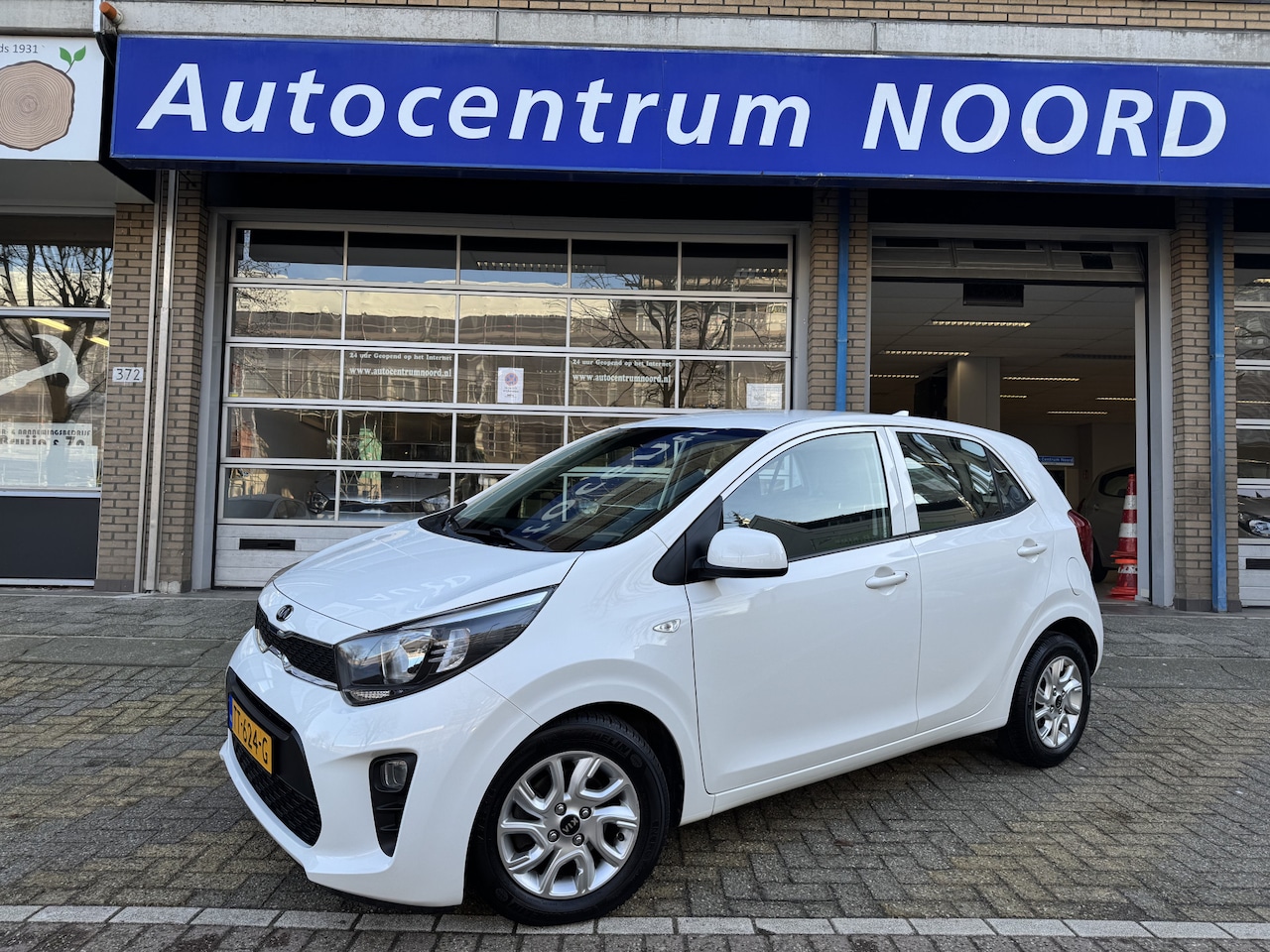 Kia Picanto - 1.0 CVVT ComfortPlusLine Navigator 65615KM! NAP | Navigatie | Apple Carplay | Achteruitrij - AutoWereld.nl