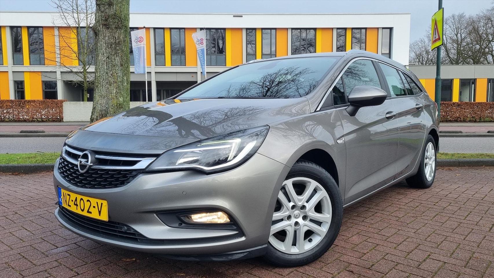 Opel Astra - 1.0 Turbo 105pk Business+ Camera/ Trekhaak - AutoWereld.nl