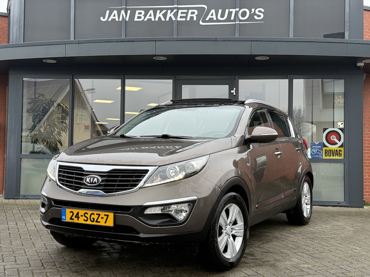 Kia Sportage - 1.6 GDI X-ecutive Plus Pack ✅ Carplay ✅ Clima ✅ Cruise ✅ Pano ✅ - AutoWereld.nl