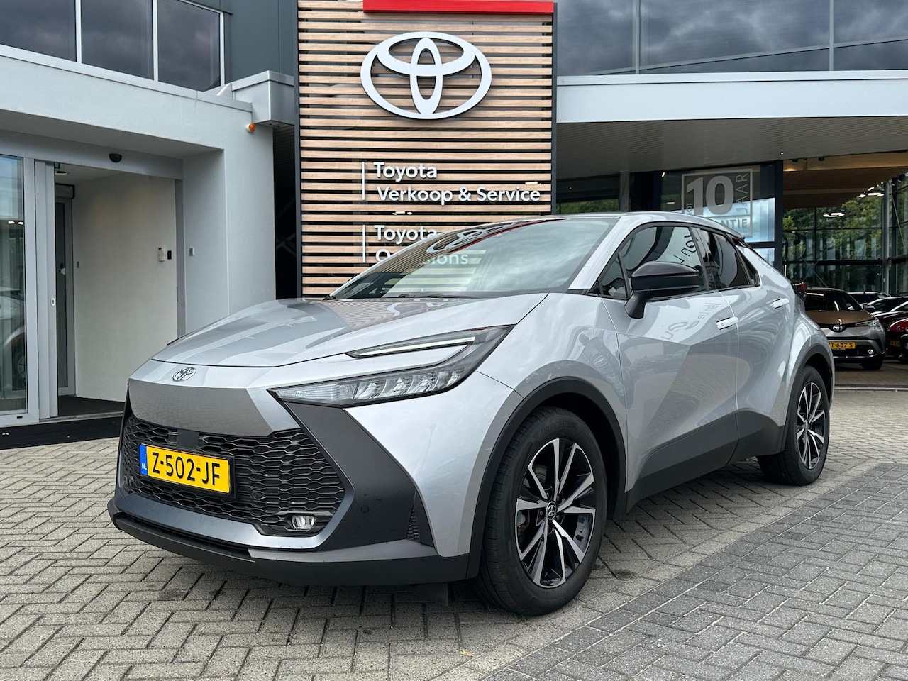 Toyota C-HR - 1.8 HYBRID 140 DYNAMIC 18" LM-VELGEN KEYLESS NAVI CLIMA AD-CRUISE APPLE/ANDROID CAMERA NL- - AutoWereld.nl