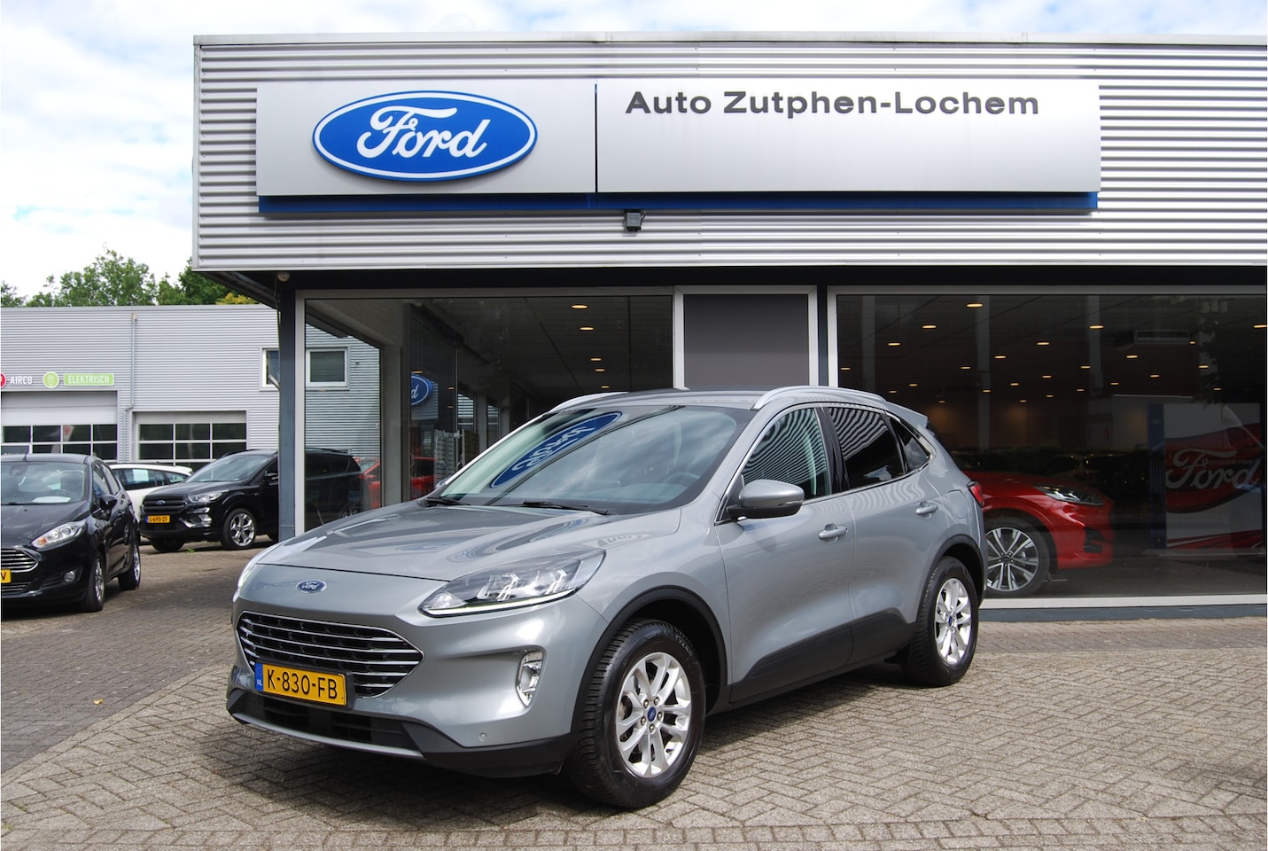 Ford Kuga - 1.5 EcoBoost 150PK Titanium NL-AUTO | 1e EIGENAAR | TREKHAAK 1800KG | CRUISE CONTROL - AutoWereld.nl