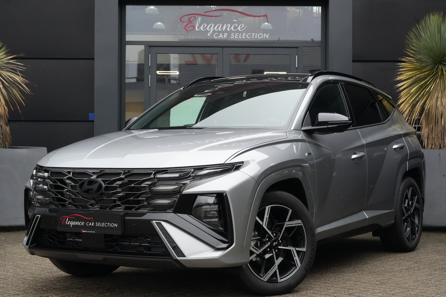 Hyundai Tucson - 1.6 T-GDI HEV N Line X-Sport 215 pk Navigatie/SmartCruiseControl/Camera - AutoWereld.nl