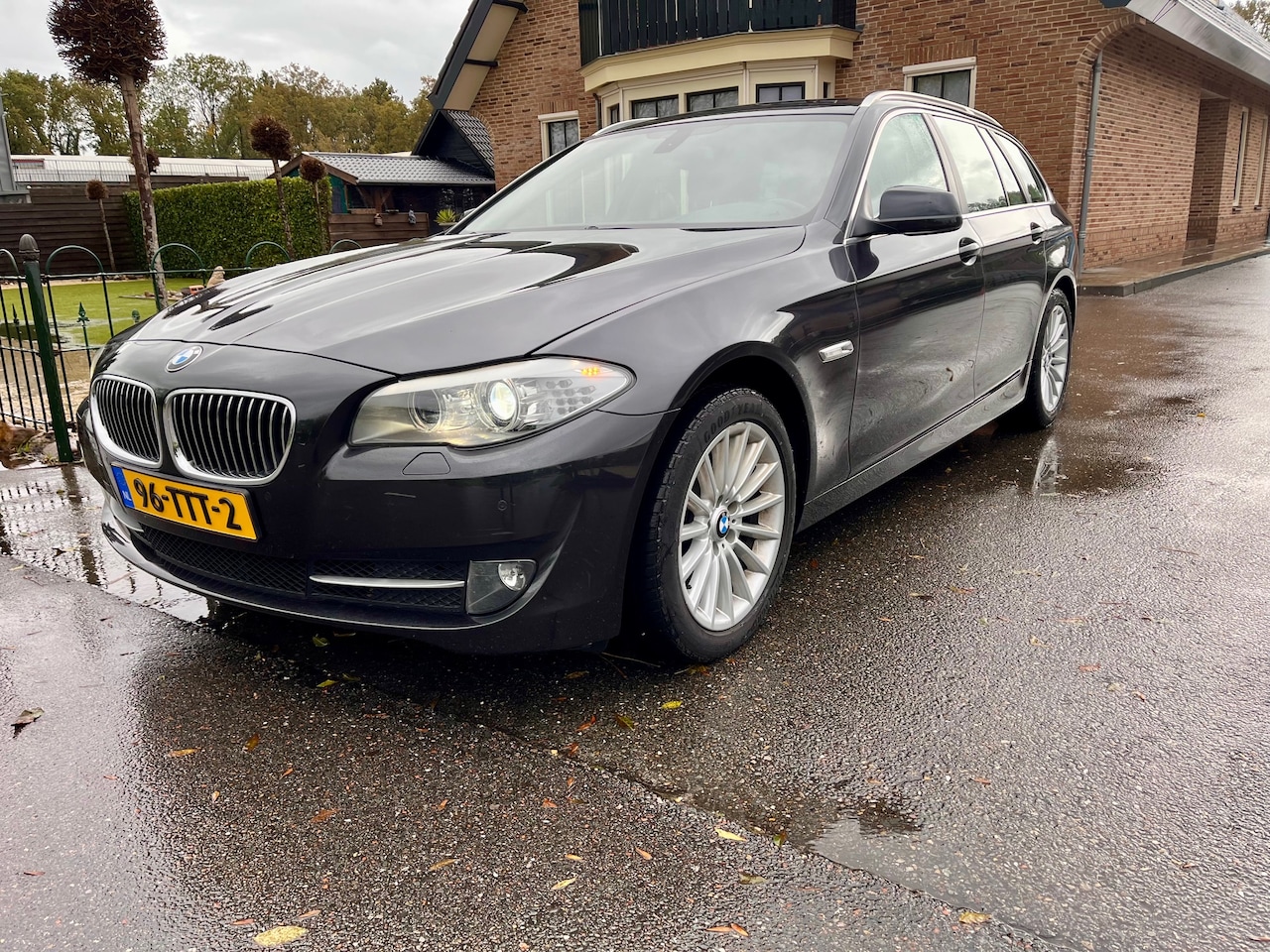 BMW 5-serie Touring - 520i High Executive 184pk - AutoWereld.nl