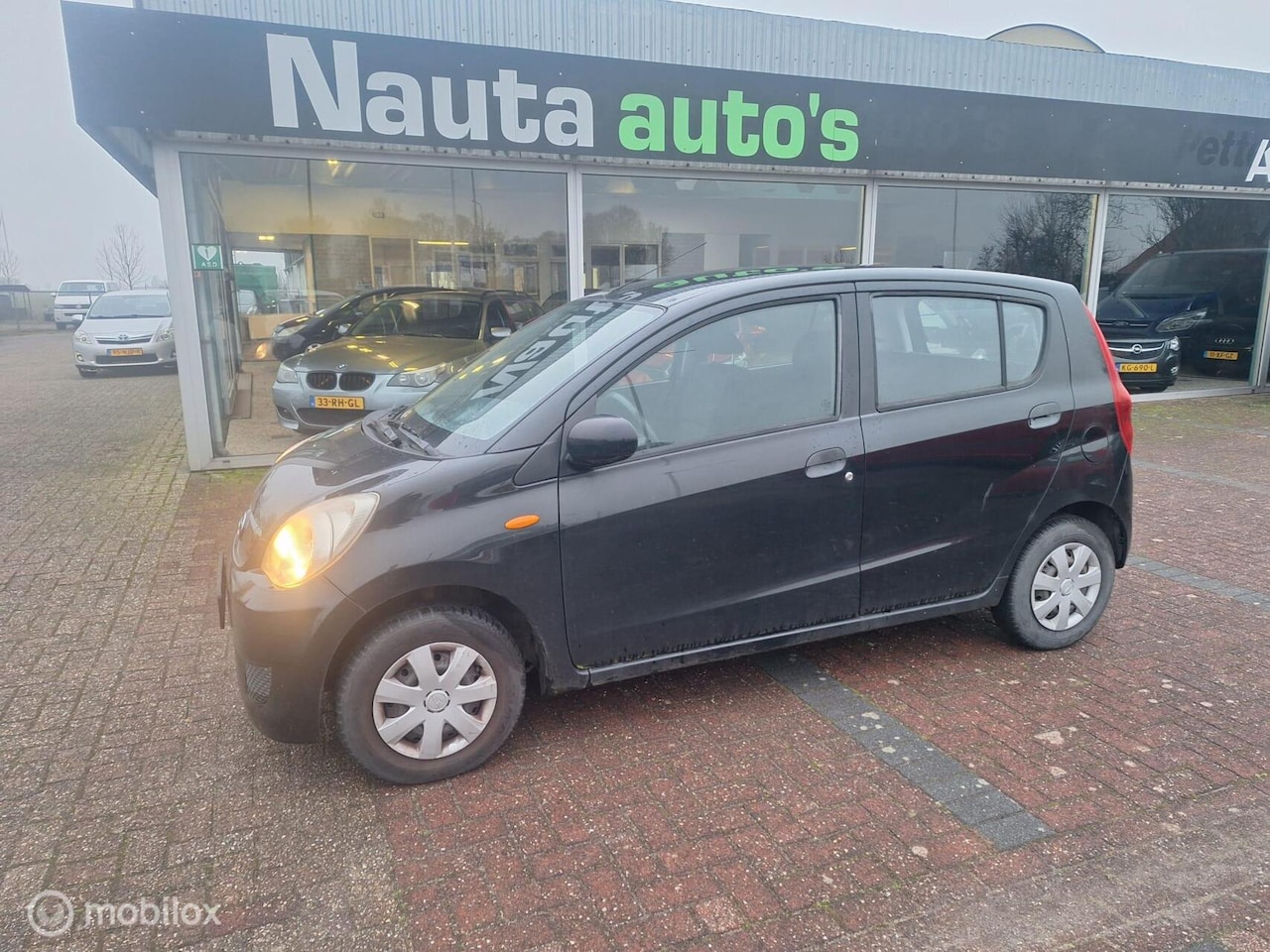 Daihatsu Cuore - 1.0 Trend 1.0 Trend - AutoWereld.nl