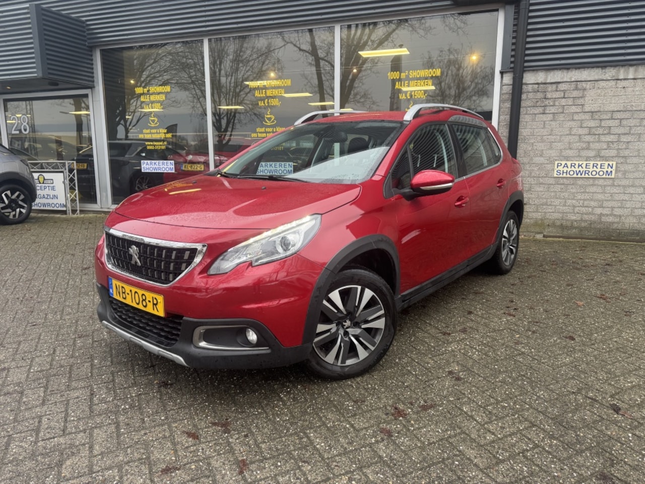 Peugeot 2008 - 1.2 PureTech Allure DB Riem VV/Carplay/Nav/Camera/PDC - AutoWereld.nl
