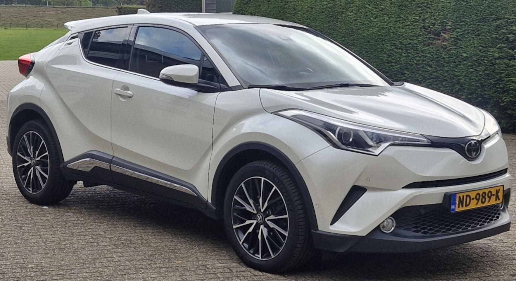 Toyota C-HR - Executive limited edition Parelmoer wit - alle opties - AutoWereld.nl