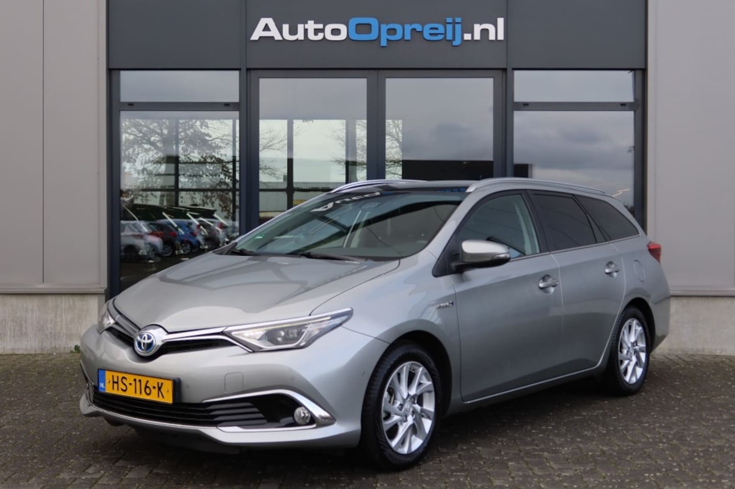 Toyota Auris Touring Sports - 1.8 Hybrid Touring Sports Lease Pro Automaat Clima, NAVI, Camera, Cruise, Panoramadak, PDC - AutoWereld.nl
