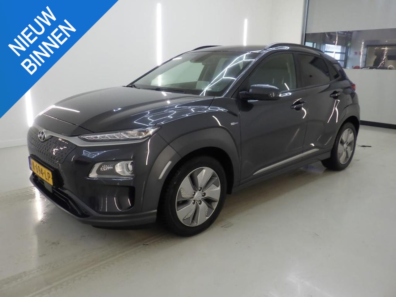 Hyundai Kona Electric - EV PREMIUM 64 KWH I 3-FASE I 100% SOH I STOELVERWARMING I ALL-IN PRIJS - AutoWereld.nl