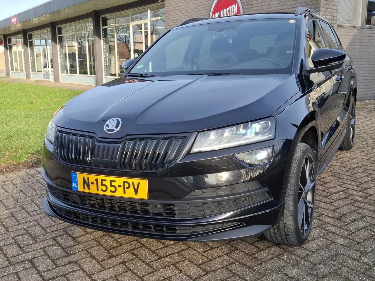 Skoda Karoq - 1.5 TSI Sportline Business, Navi,Cruise,Clima - AutoWereld.nl