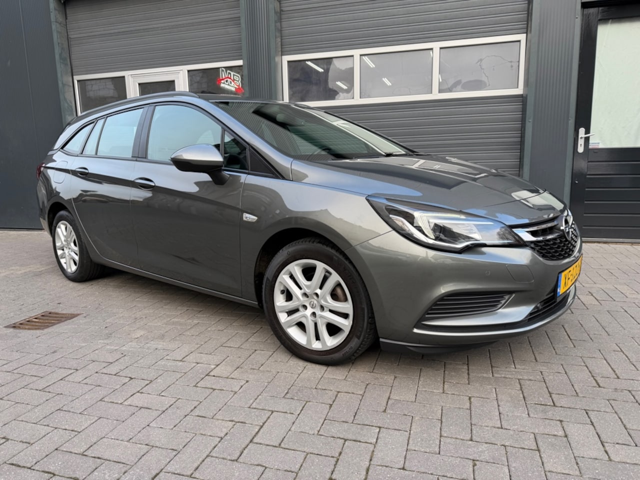 Opel Astra Sports Tourer - 1.0 Turbo Online Edition - AutoWereld.nl
