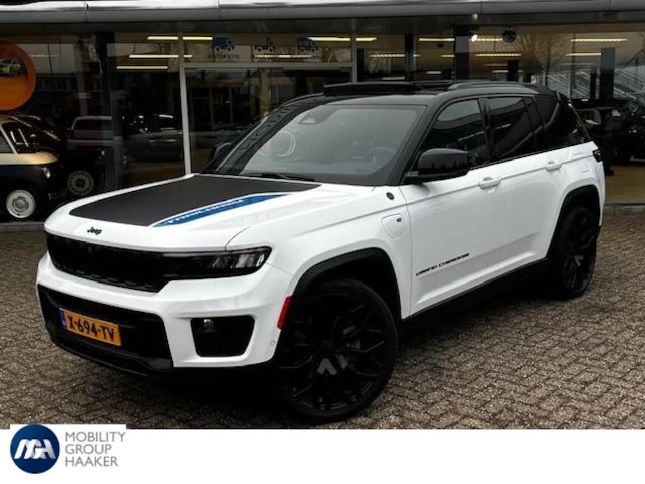 Jeep Grand Cherokee - Trailhawk 4xe Plug-in Hybrid | 22" BRUTE velgen | Apple carplay/Andriod auto | Navigatie | - AutoWereld.nl