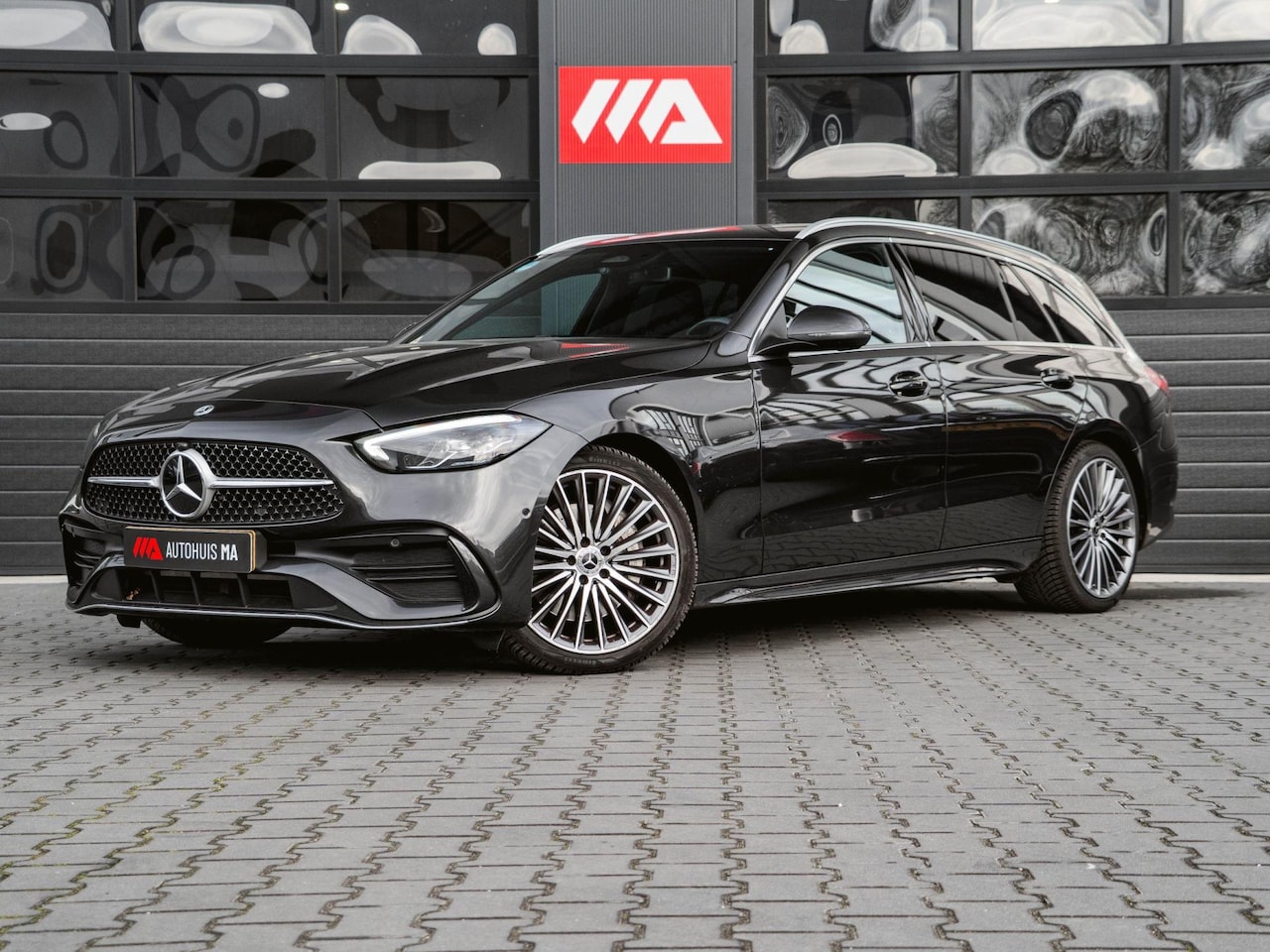 Mercedes-Benz C-klasse Estate - AMG Line Cruise|Camera|Navi|Trekhaak|Sfeerverlichting|Stoelverwarming - AutoWereld.nl