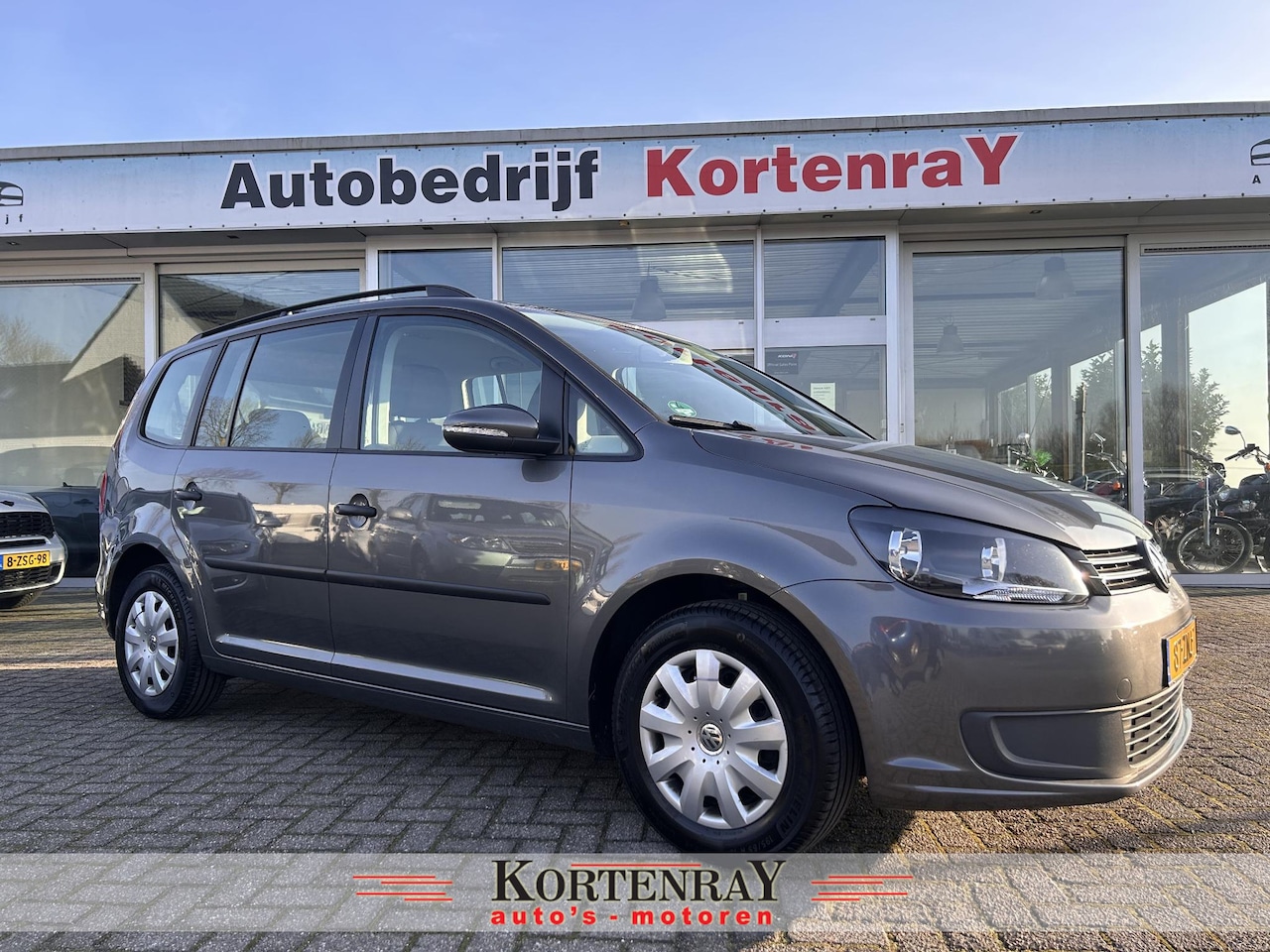 Volkswagen Touran - 1.2 TSI Trendline Bluemotion 7p. 1e eigenaar/100% dealer onderhouden/navi/airco/cruise con - AutoWereld.nl