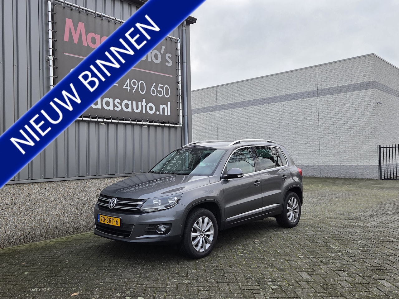 Volkswagen Tiguan - 1.4 TSI Sport&Style uitvoering navigatie !!! - AutoWereld.nl