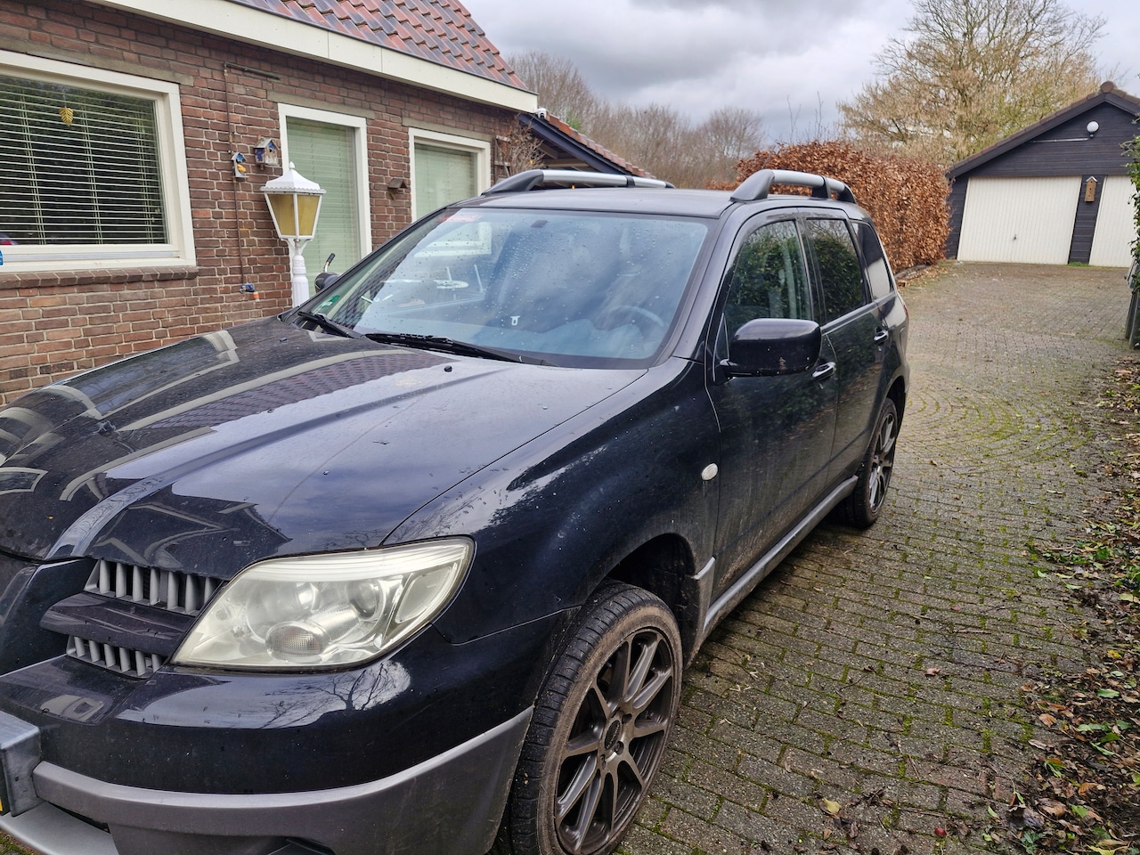 Mitsubishi Outlander - 2.0 Invite plus - AutoWereld.nl