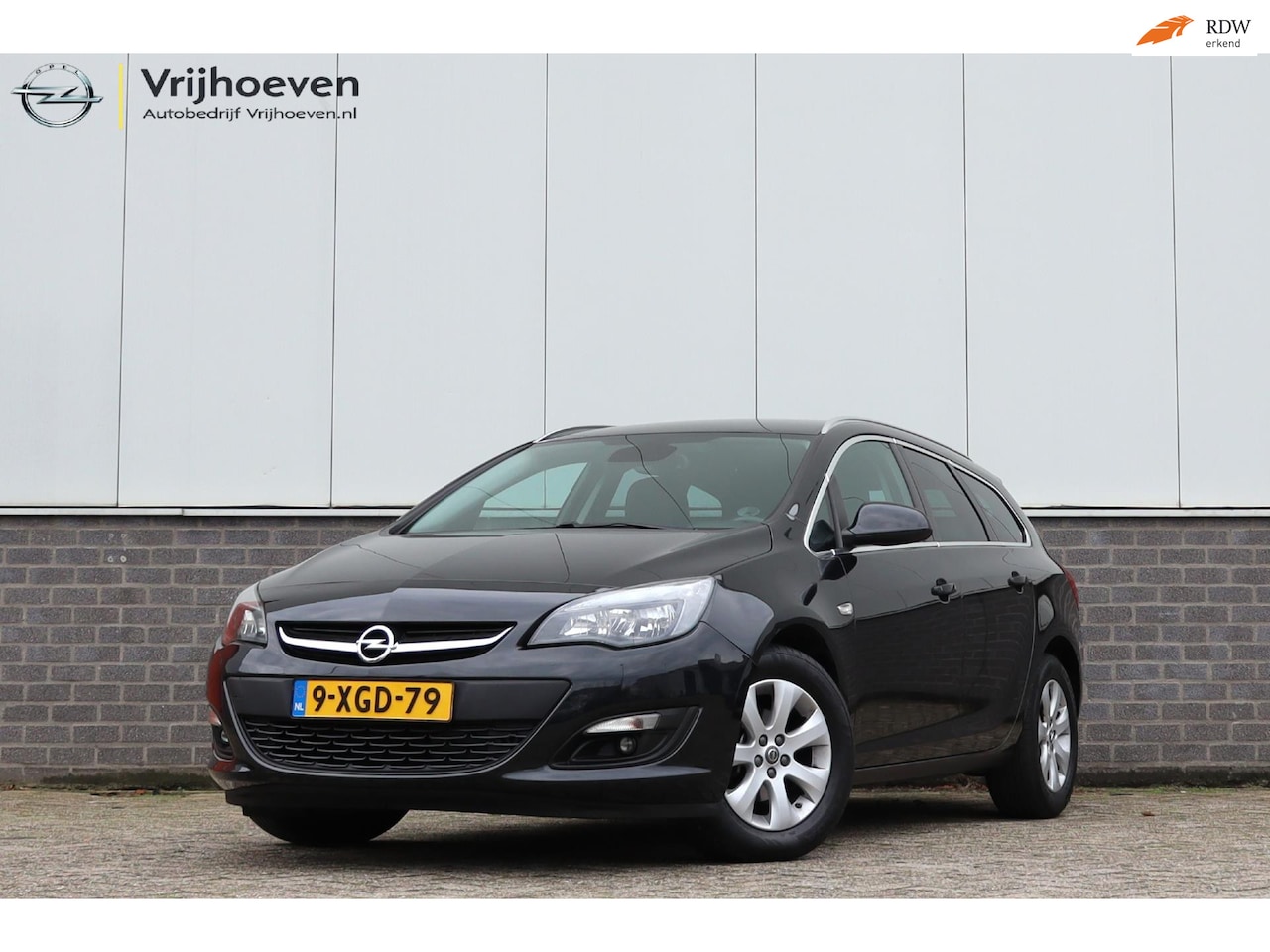 Opel Astra Sports Tourer - 1.4 Turbo Business + Trekhaak - AutoWereld.nl