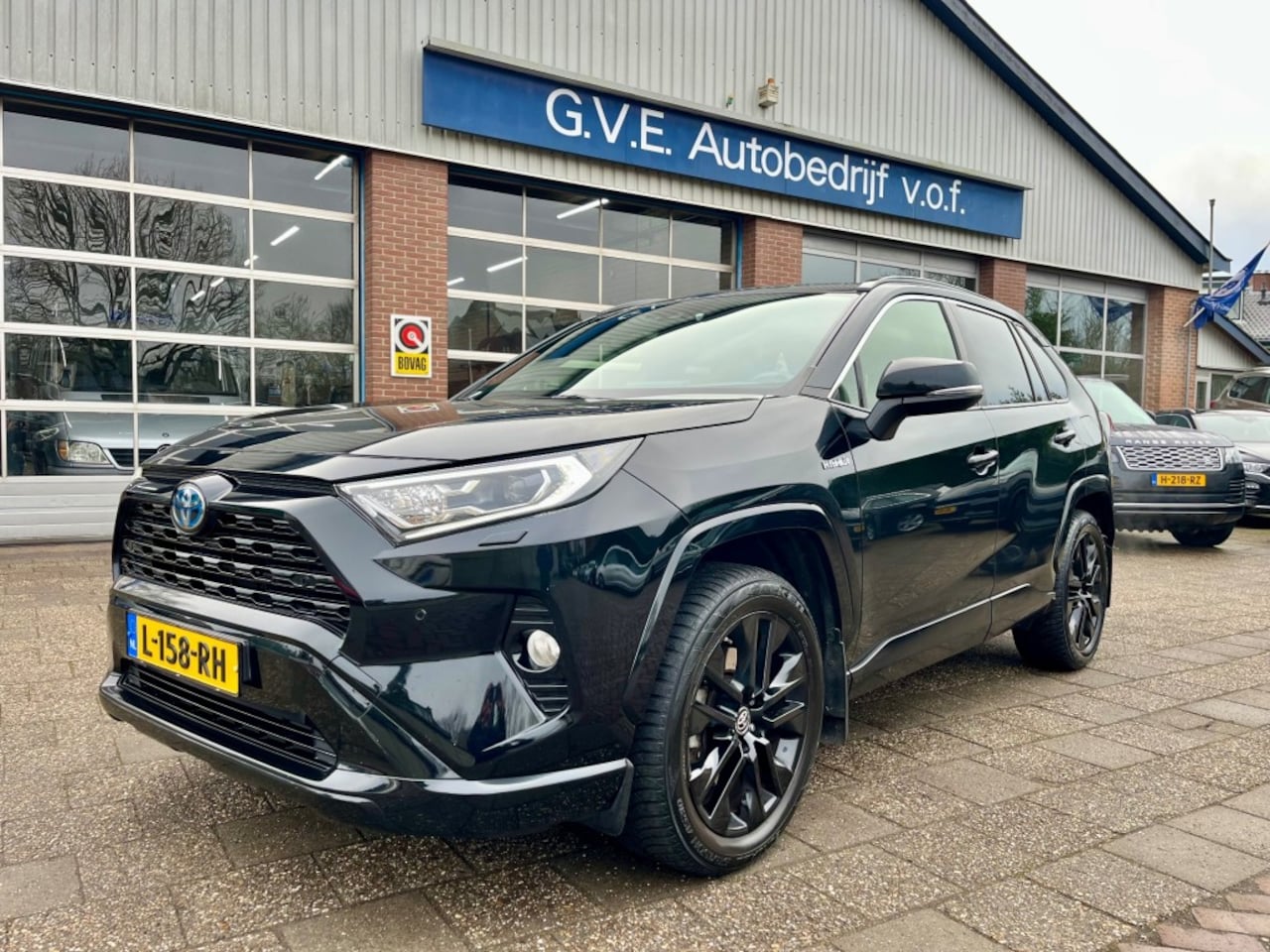 Toyota RAV4 - 2.5 HYBRID AWD BL.ED LEER,TREKHAAK,CAMERA,JBL - AutoWereld.nl