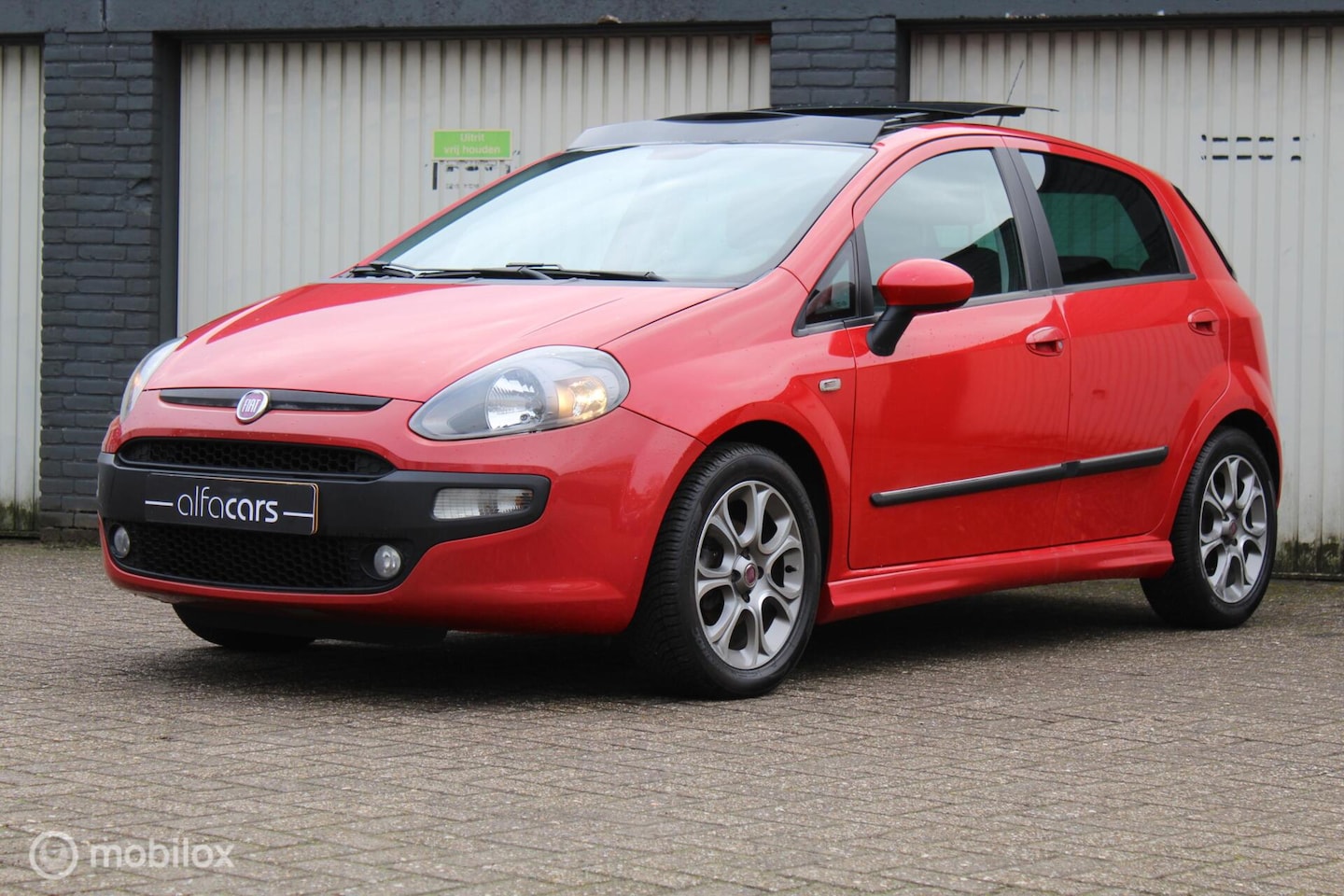 Fiat Punto Evo - 1.4-16V Multiair l pano l 2e eigenaar l airco l - AutoWereld.nl
