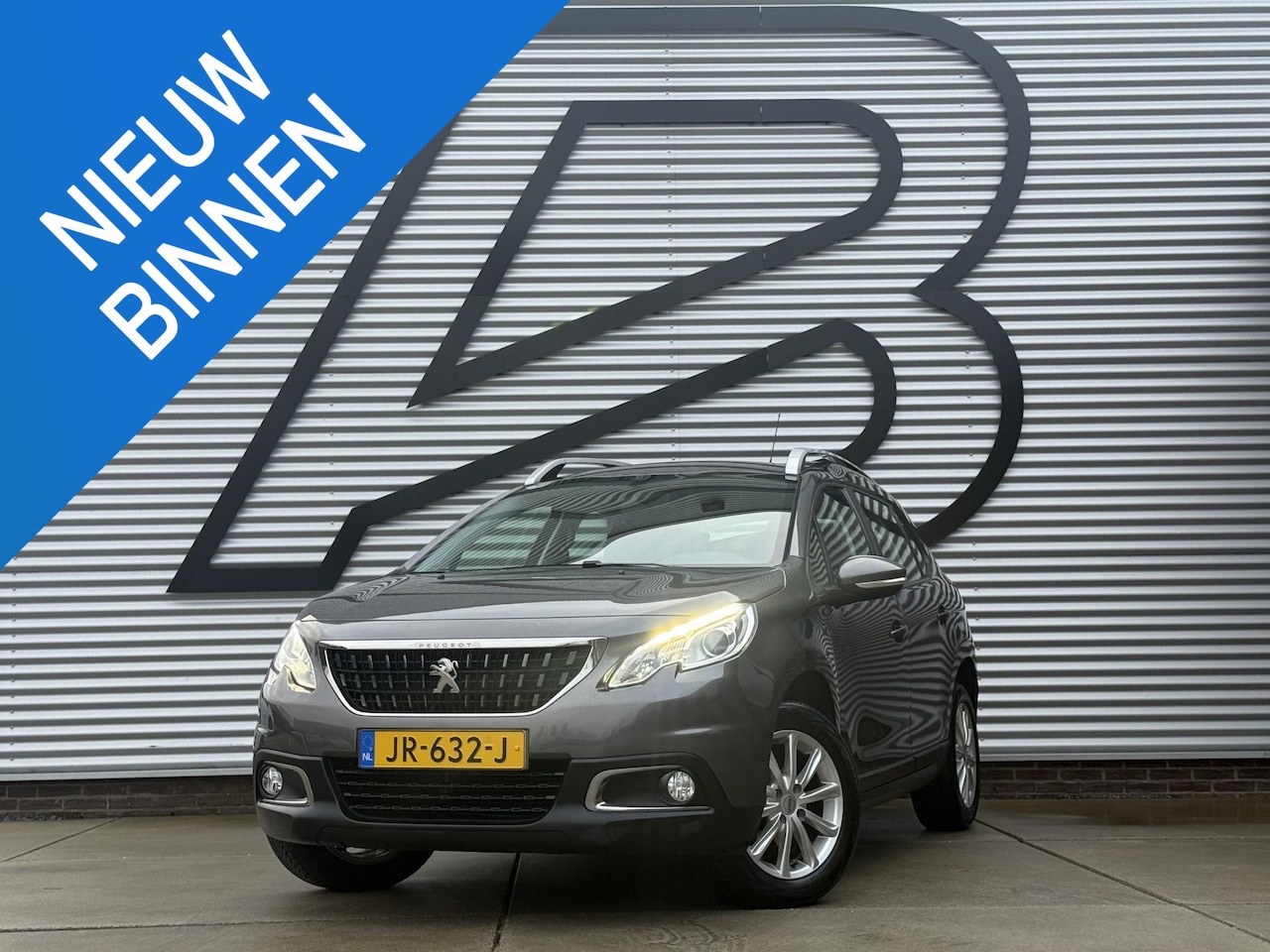 Peugeot 2008 - 1.2 PureTech Blue Lion Navi|Carplay|Cruise|PDC|Airco|D-riem v vin 2023|N.A.P|APK tot 03-20 - AutoWereld.nl