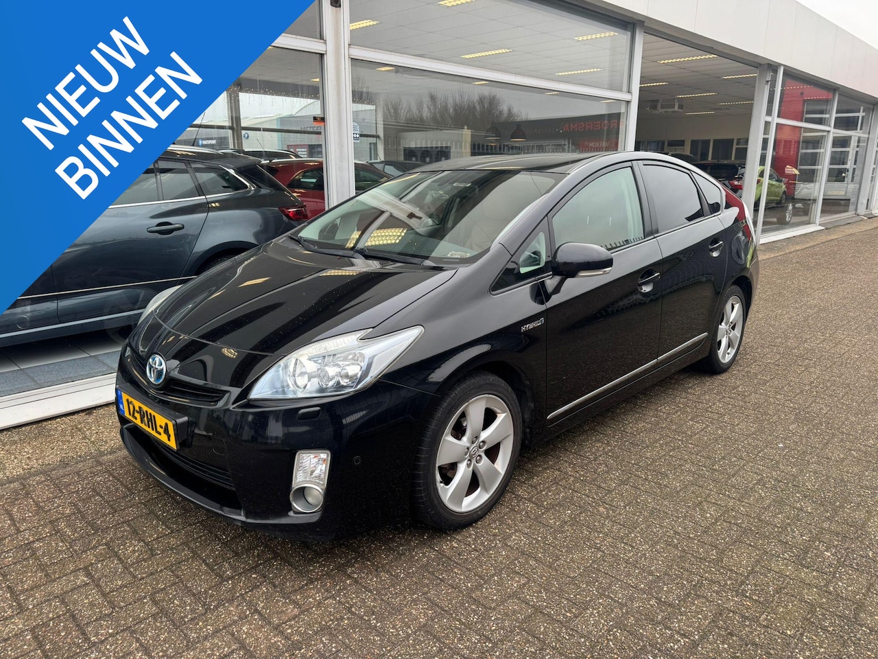 Toyota Prius - 1.8 Dynamic Business | Automaat | Elektrische ramen | Cruise control | Ledere bekleding | - AutoWereld.nl