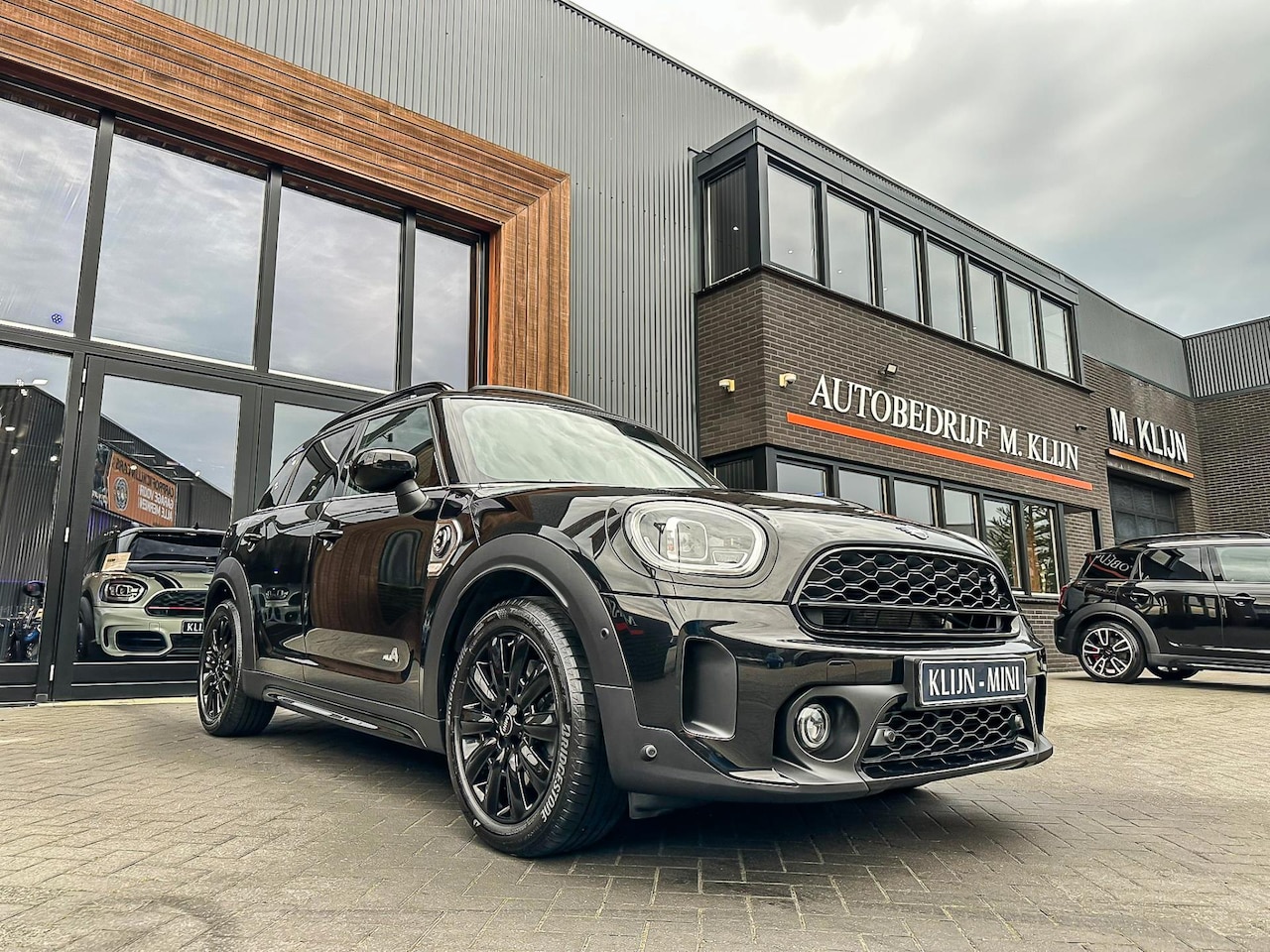 MINI Countryman - Mini 2.0 Cooper S E ALL4 ALL4 220pk Blackline/Leer/Pano/HK/Camera/Vol - AutoWereld.nl
