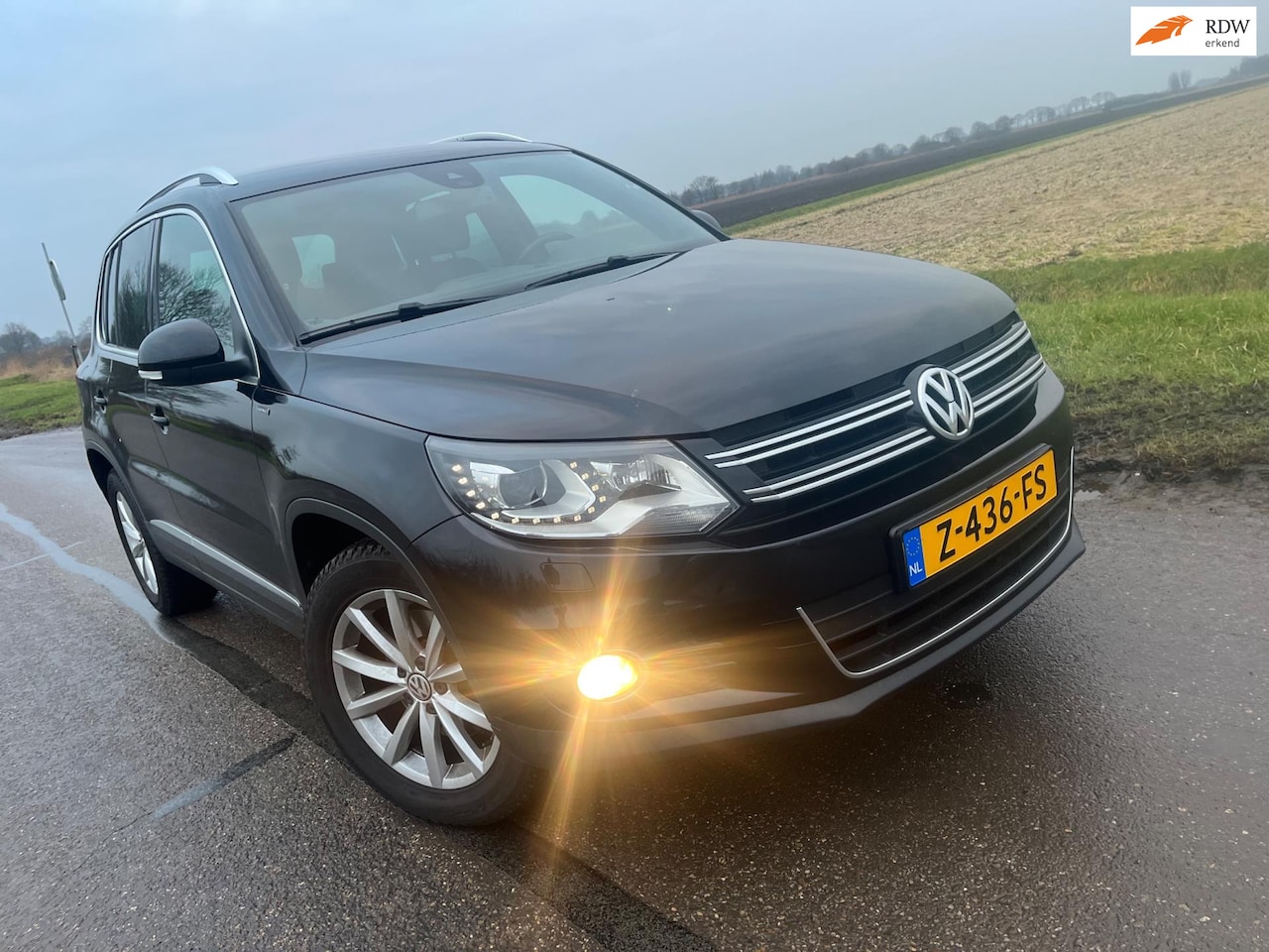 Volkswagen Tiguan - 1.4 TSI Sport&Style / 96.000km automaat - AutoWereld.nl