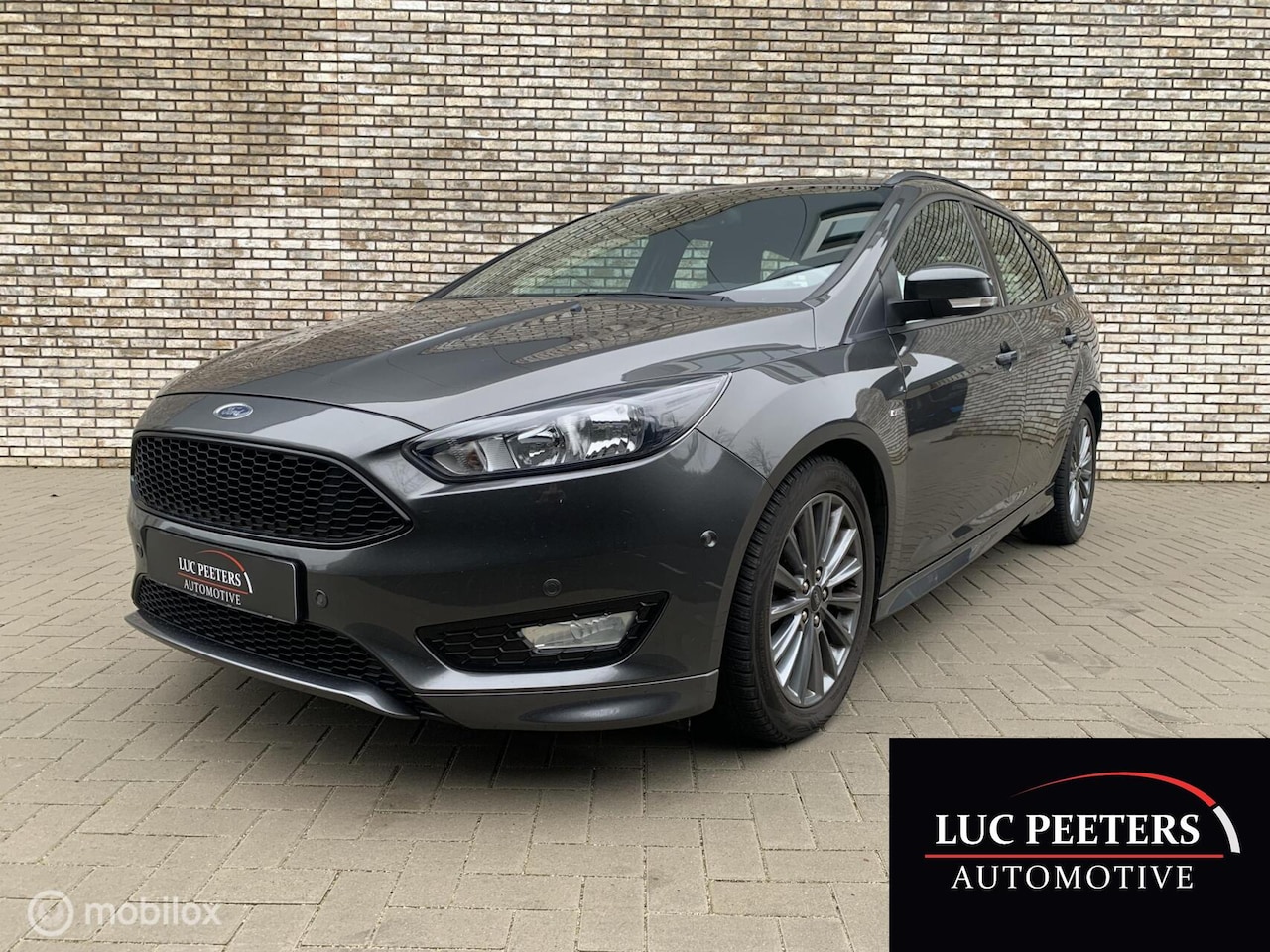 Ford Focus Wagon - 1.0 ST-Line/NAP/2EIG/DEALEROH/154000KM!! - AutoWereld.nl