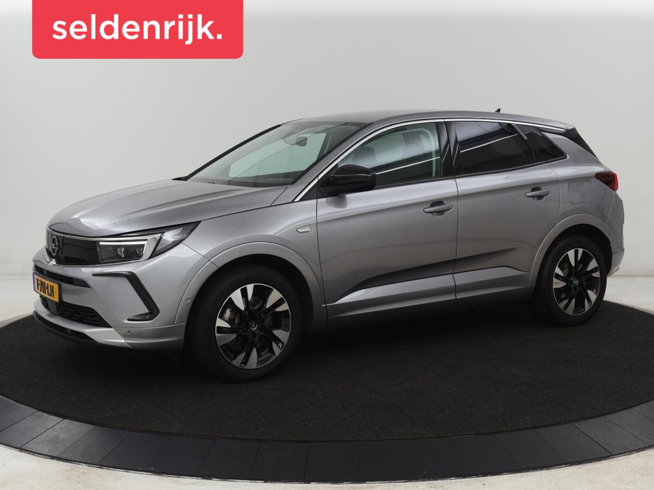 Opel Grandland - 1.6 Turbo Plug-In Hybrid Level 3 | Trekhaak | Adaptive cruise | 360 Camera | Navigatie | C - AutoWereld.nl