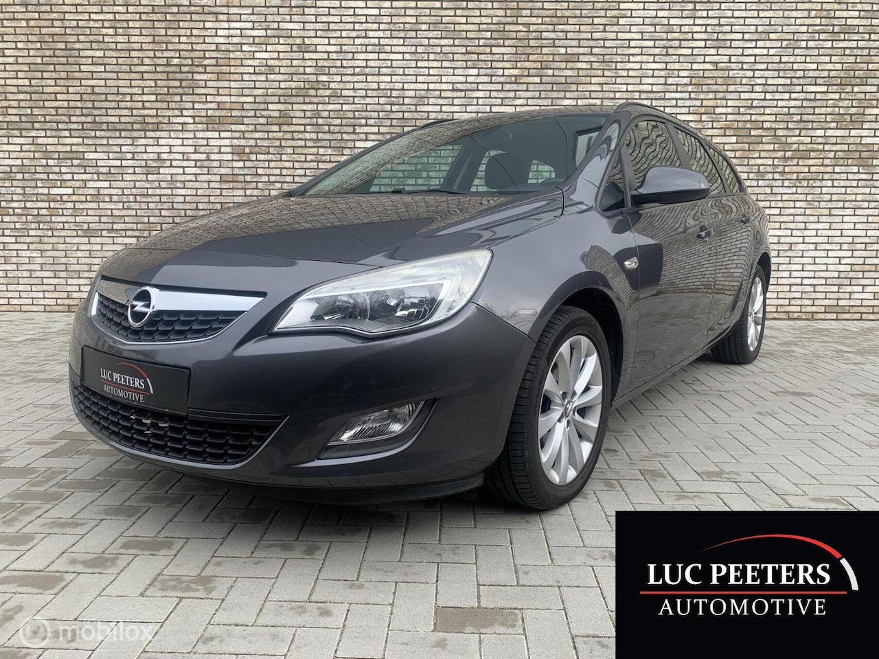 Opel Astra Sports Tourer - 1.4 Turbo Business +/NAP/NAVI/TREKH - AutoWereld.nl