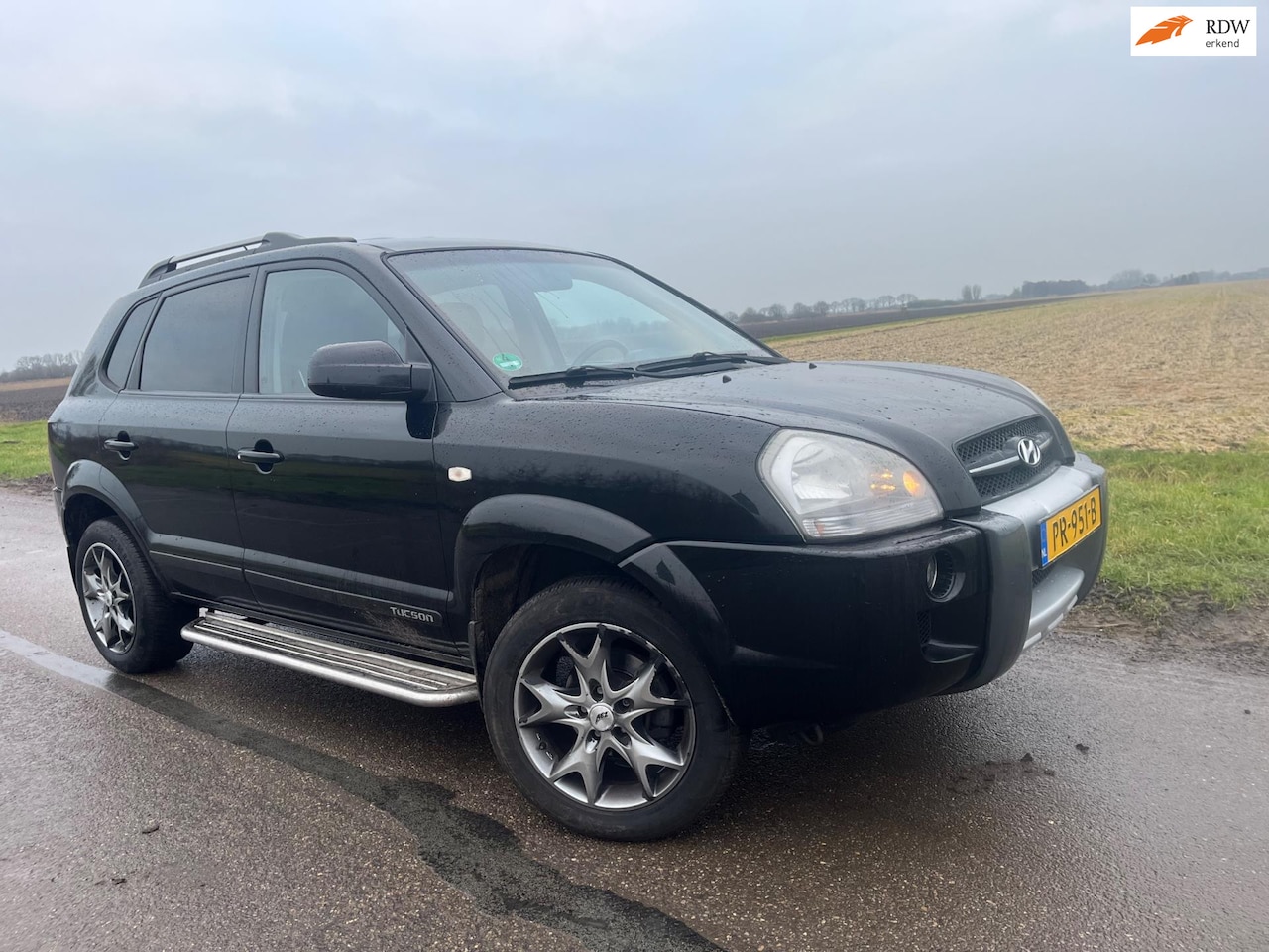 Hyundai Tucson - 2.0i Active / 150.000km leder - AutoWereld.nl
