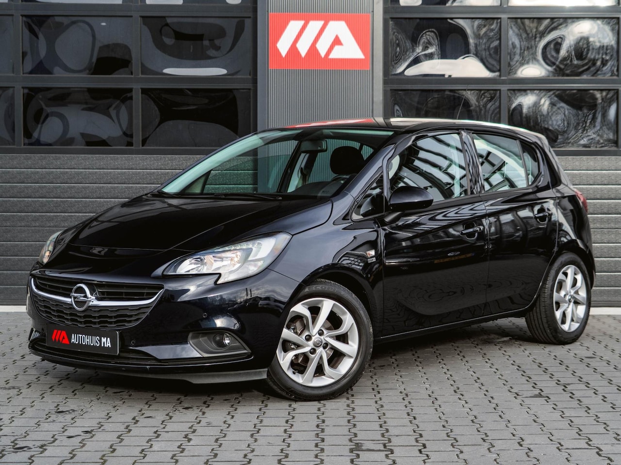 Opel Corsa - 1.4 120 Jaar Edition Airco|Camera|Clima|Cruise|LMV - AutoWereld.nl