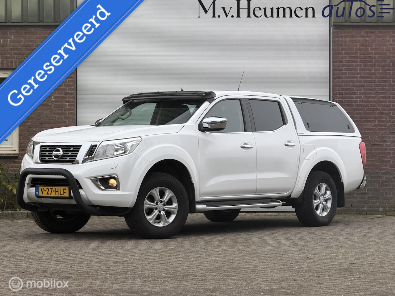 Nissan Navara - 2.3 dCi Visia King Cab Road Ranger Luxe uitvoering - AutoWereld.nl