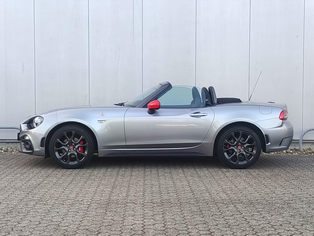 Fiat 124 Spider - Abarth MultiAir Turbo 170k Automaat I WINTERSALE | Two Tone Leder I Navigatie I Cruise Con - AutoWereld.nl