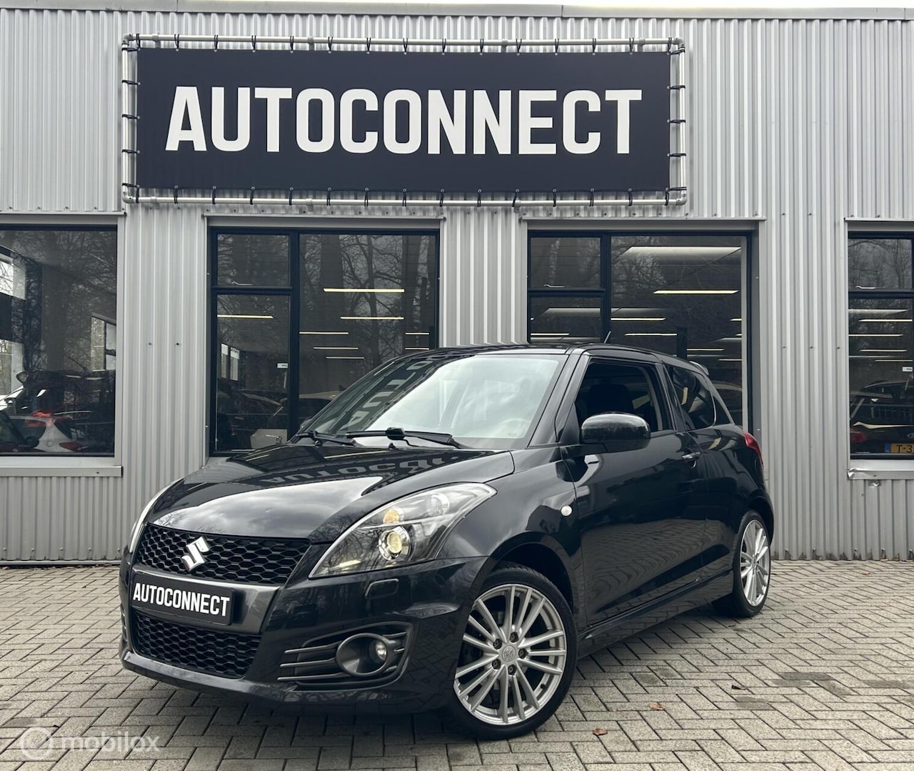 Suzuki Swift - 1.6 Sport 1.6 Sport, CRUISE, ECC/AIRCO, STOELVERW. - AutoWereld.nl
