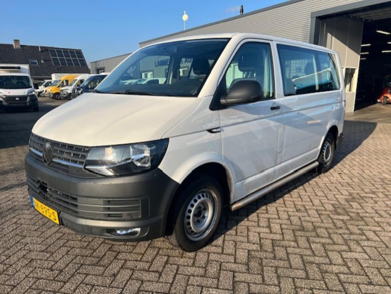 Volkswagen Transporter Kombi - 2.0 TDI L1H1 110KW AUTOMAAT PKW BRIEF 8 PERSOONS - AutoWereld.nl