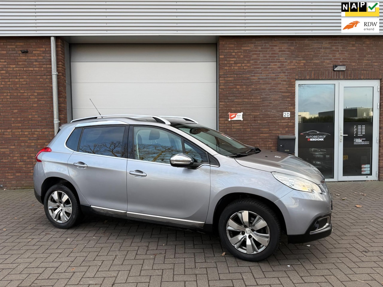 Peugeot 2008 - 1.2 PureTech Allure|PANO|NAVI|NIEUWE APK|AUTOMAAT - AutoWereld.nl
