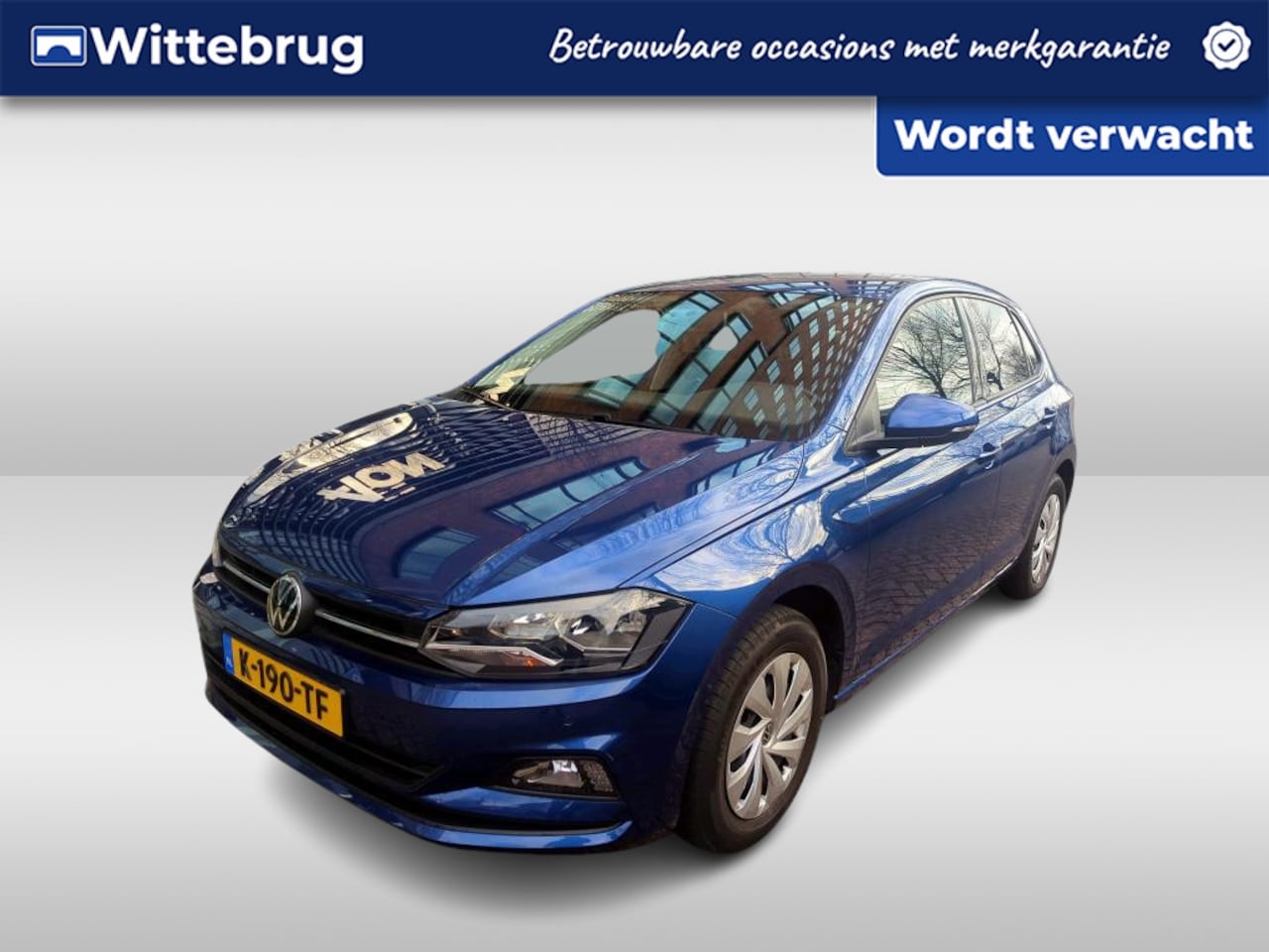 Volkswagen Polo - 1.0 TSI Comfortline / NAVI/ AIRCO/ PARK. SENSOREN/ CRUISE - AutoWereld.nl